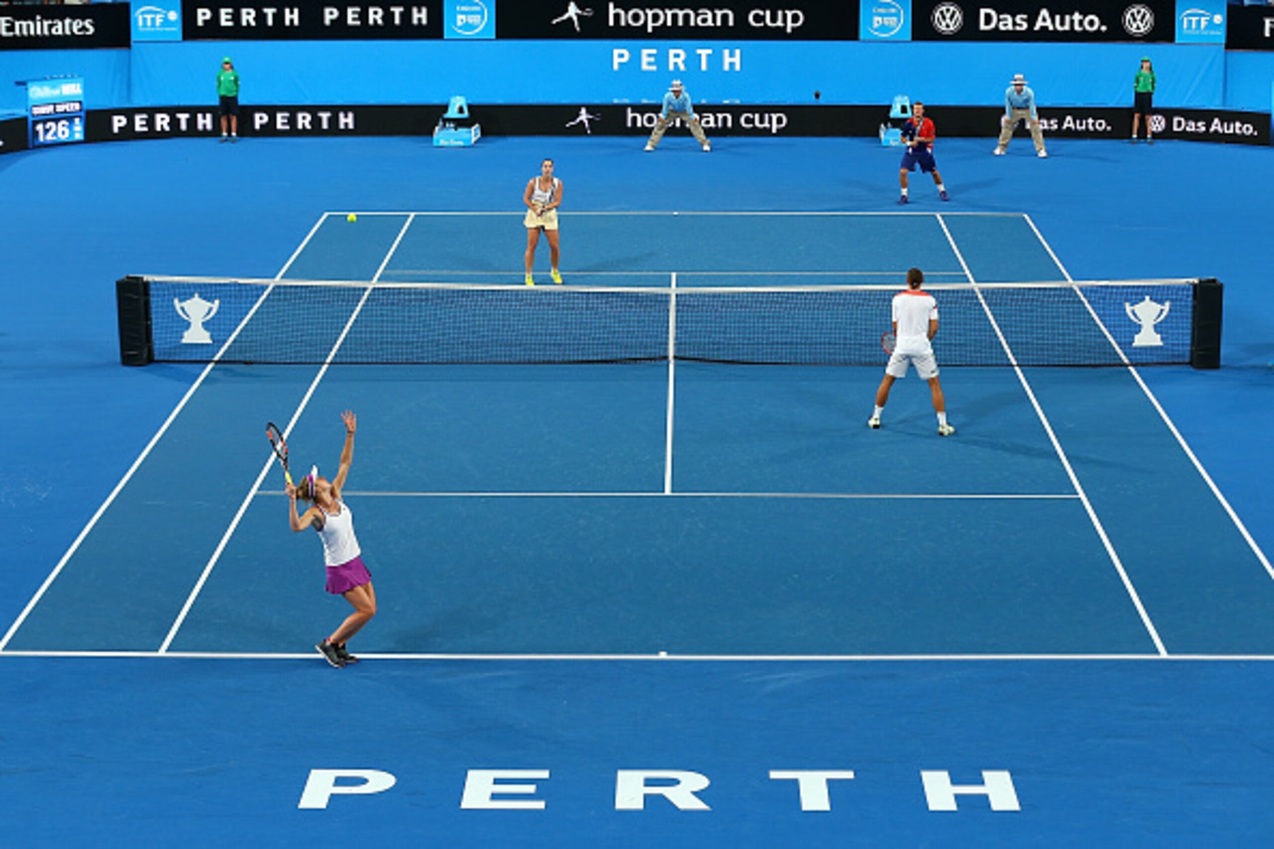PERTH, AUSTRALIA - JANUARY 07:  Elina Svitolina of the Ukraine partnered with Alexandr Dolgopolov serves in the mixed doubles match against Jarmila Wolfe and Lleyton Hewitt of Australia Gold during day five of the 2016 Hopman Cup at Perth Arena on January