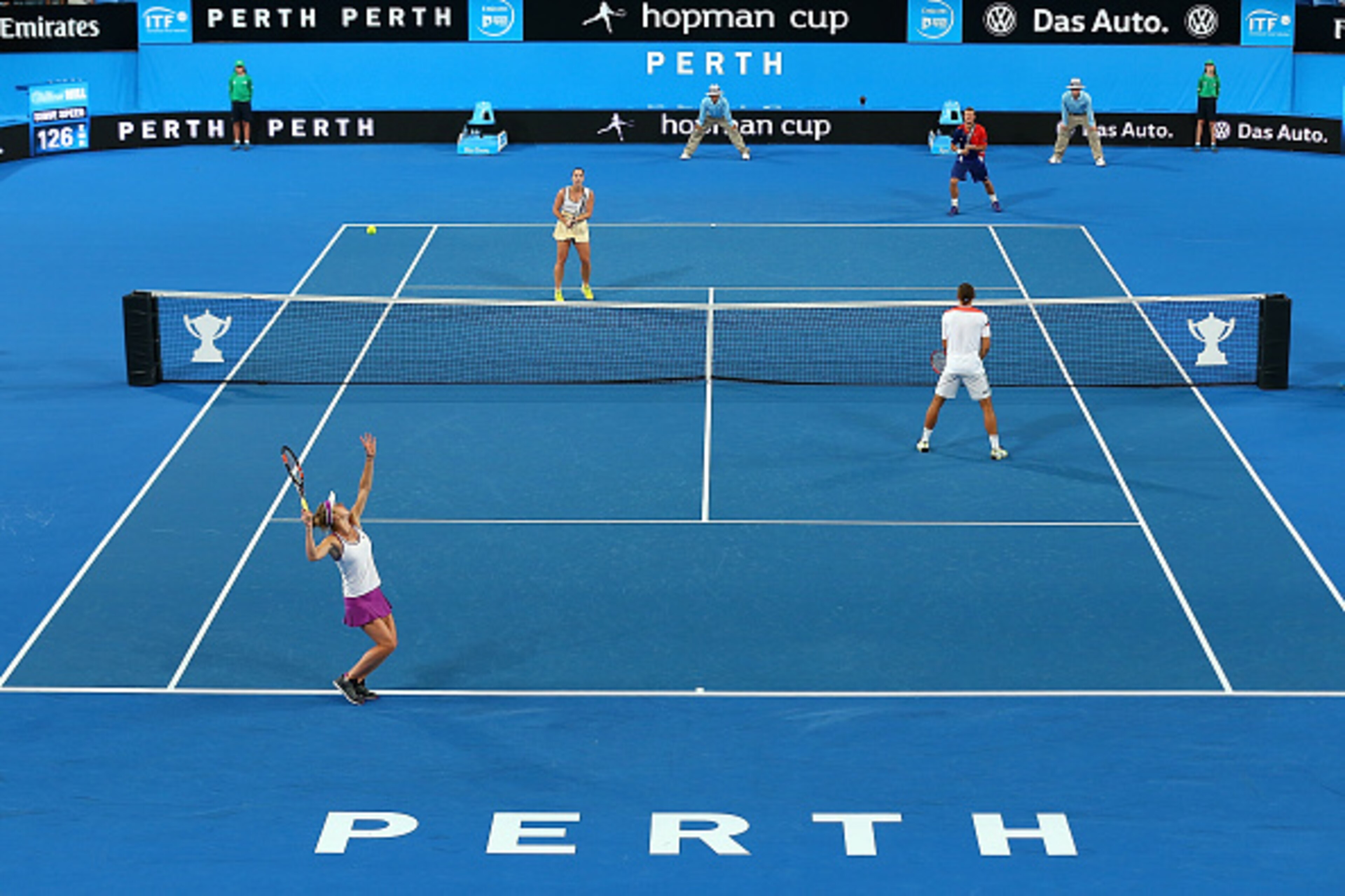 PERTH, AUSTRALIA - JANUARY 07:  Elina Svitolina of the Ukraine partnered with Alexandr Dolgopolov serves in the mixed doubles match against Jarmila Wolfe and Lleyton Hewitt of Australia Gold during day five of the 2016 Hopman Cup at Perth Arena on January