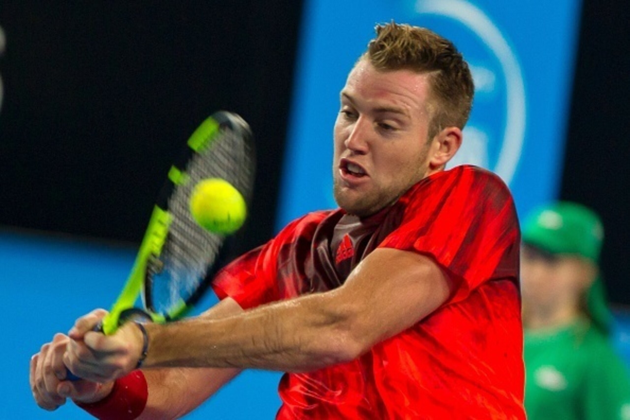 Jack Sock of the US hits a return against Jiri Vesely of the Czech Republic during their tenth session men's singles match on day five of the Hopman Cup tennis tournament in Perth on January 7, 2016.     AFP PHOTO / Tony ASHBY  
-IMAGE RESTRICTED TO EDITO