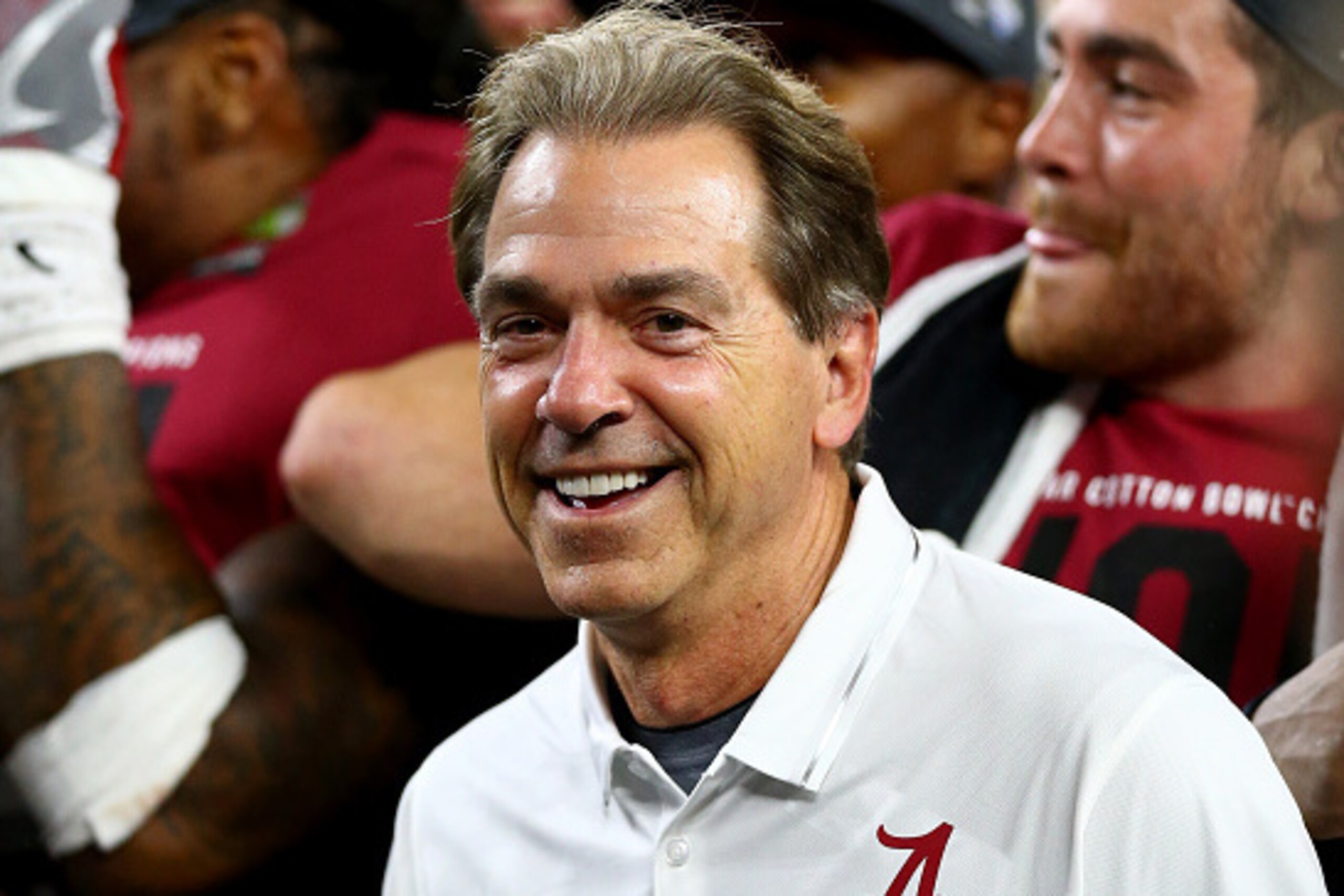 ARLINGTON, TX - DECEMBER 31:  Head coach Nick Saban of the Alabama Crimson Tide celebrates with the trophy after defeating the Spartans 38 to 0 in the Goodyear Cotton Bowl at AT&T Stadium on December 31, 2015 in Arlington, Texas.  (Photo by Ronald Martine