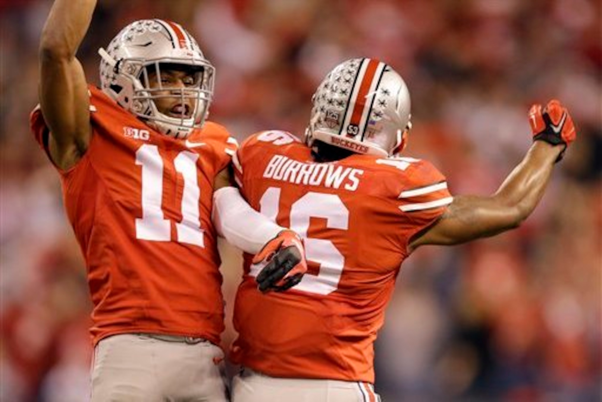 Vonn Bell (11) and Cam Burrows (16).