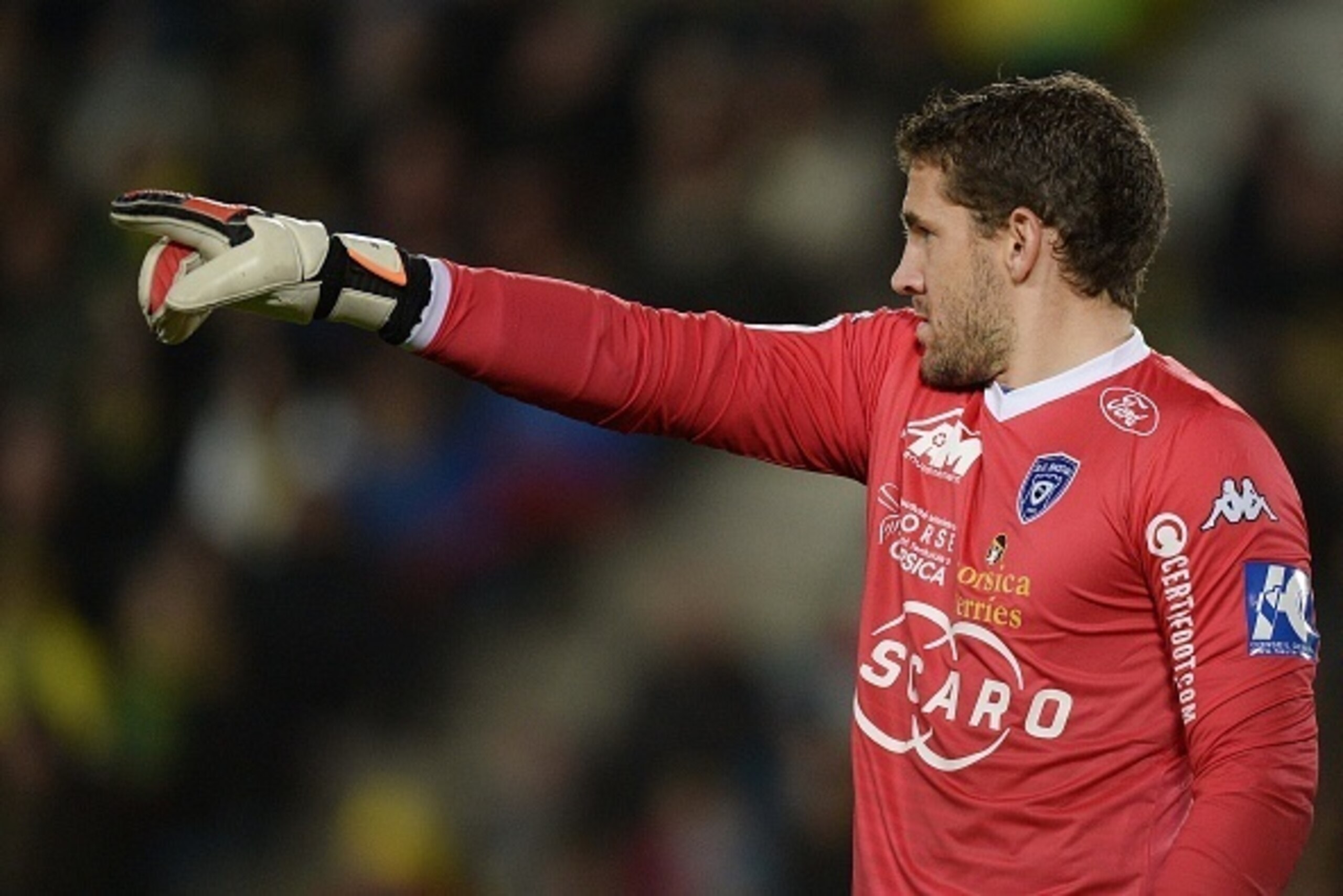 Bastia's French goalkeeper Jean Louis Leca gestures during the French L1 football match between Nantes and Bastia on November 28, 2015 at the Beaujoire stadium in Nantes, western France.  / AFP / JEAN-SEBASTIEN EVRARD        (Photo credit should read JEAN