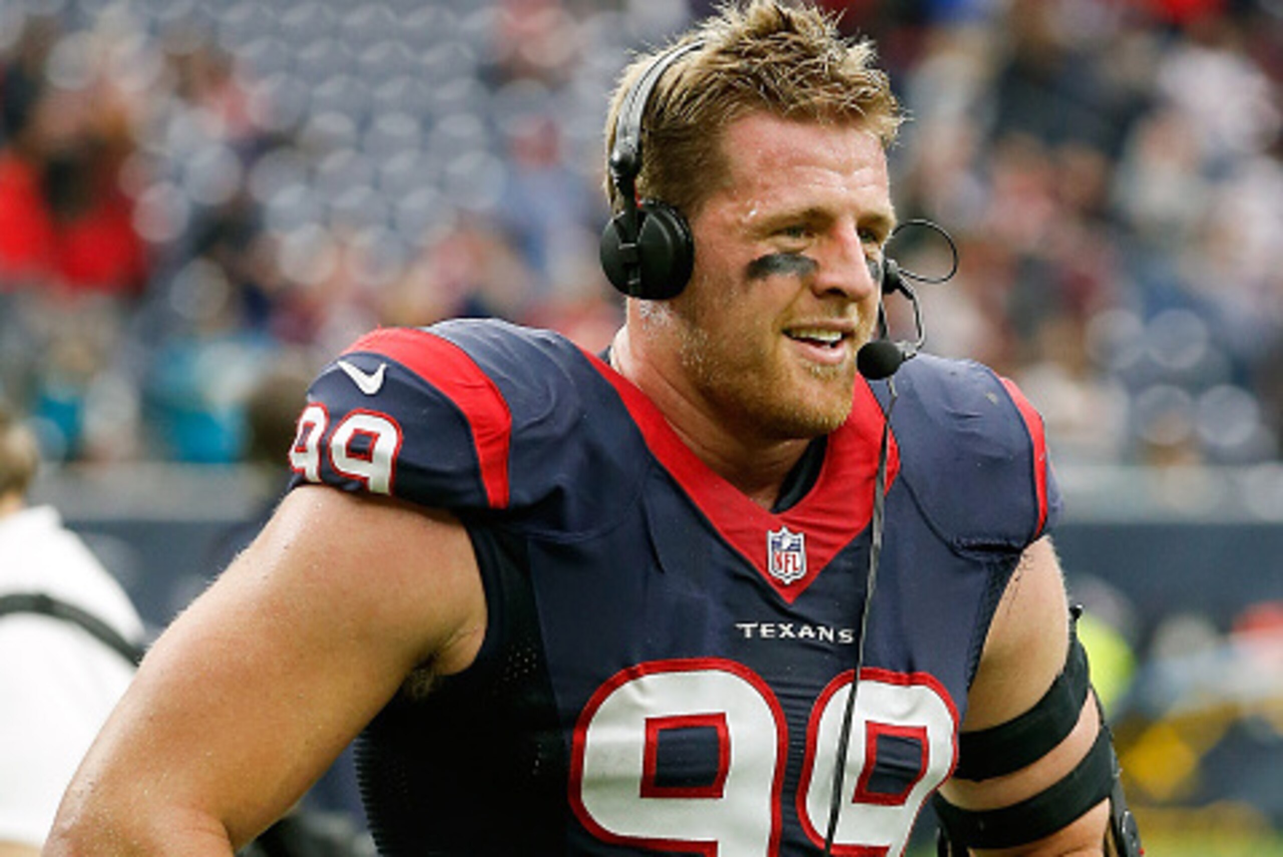HOUSTON, TX - JANUARY 03:  J.J. Watt #99 of the Houston Texans does a post-game interview after defeating the Jacksonville Jaguars to win the AFC South  championship at NRG Stadium on January 3, 2016 in Houston, Texas.  (Photo by Bob Levey/Getty Images)