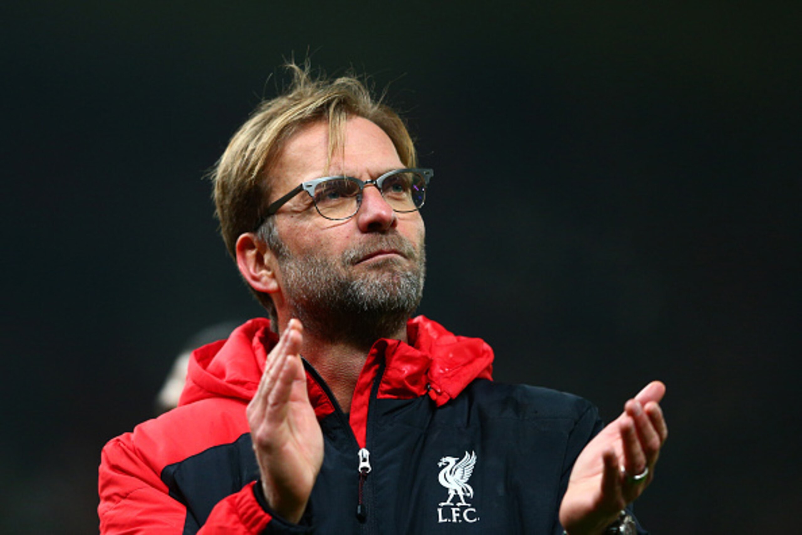 STOKE ON TRENT, ENGLAND - JANUARY 05:  Jurgen Klopp the Manager of Liverpool applauds the fans following their team's 1-0 victory during the Capital One Cup semi final, first leg match between Stoke City and Liverpool at the Britannia Stadium on January 5