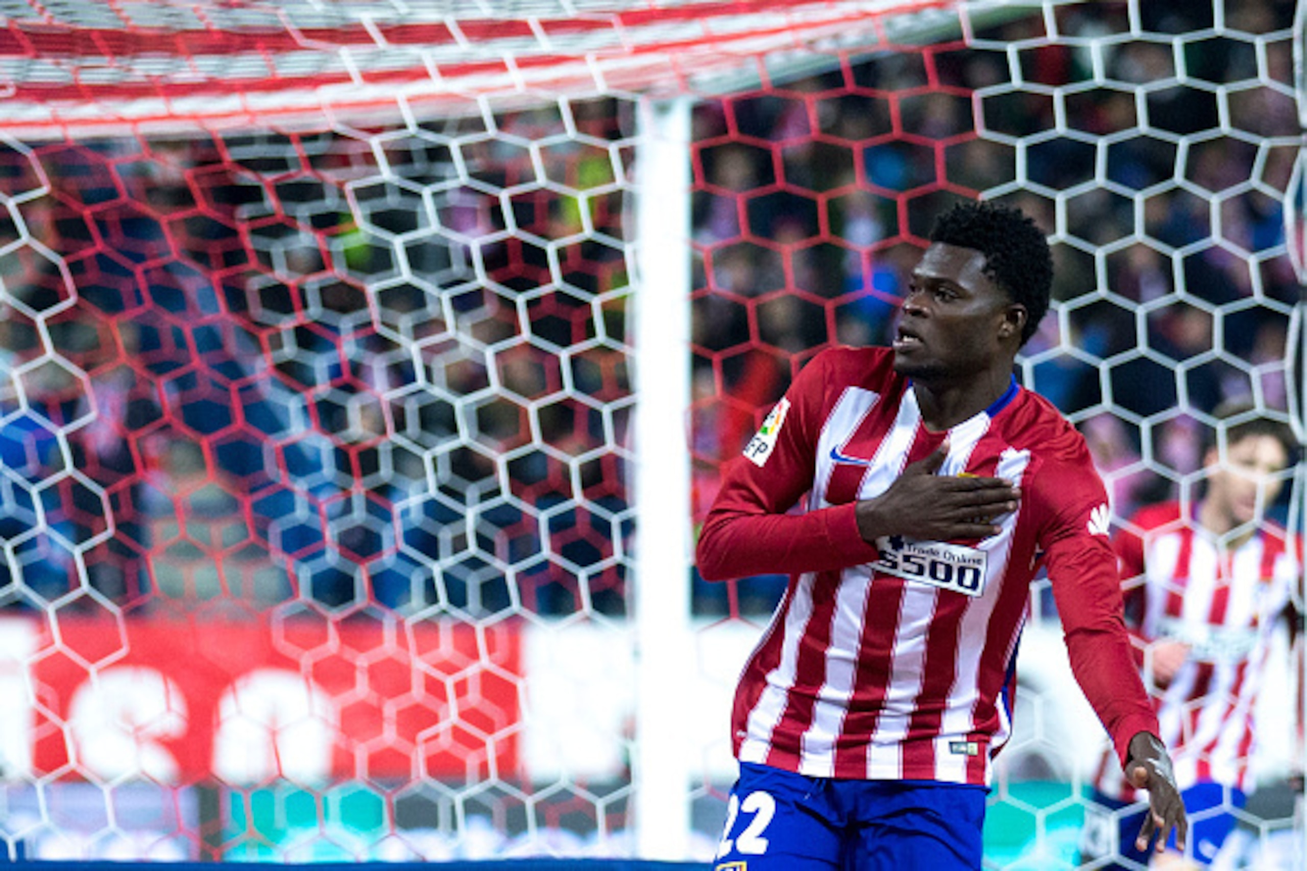 MADRID, SPAIN - JANUARY 02:  Thomas Teye Partey of Atletico de Madrid celebrates scoring their opening goal during the La Liga match between Club Atletico de Madrid and Levante UD at Vicente Calderon Stadium on January 2, 2016 in Madrid, Spain.  (Photo by