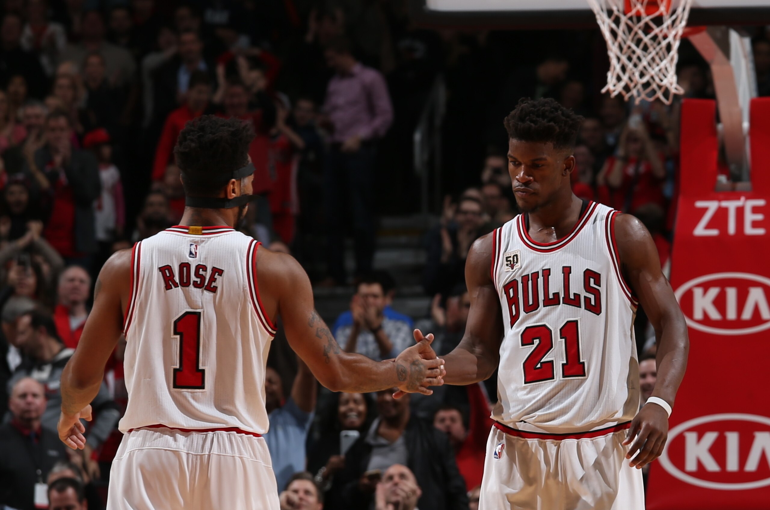 CHICAGO, IL - NOVEMBER 13:  Jimmy Butler #21 of the Chicago Bulls high fives teammate Derrick Rose #1 during the game against the Charlotte Hornets on November 13, 2015 at the United Center in Chicago, Illinois. NOTE TO USER: User expressly acknowledges a