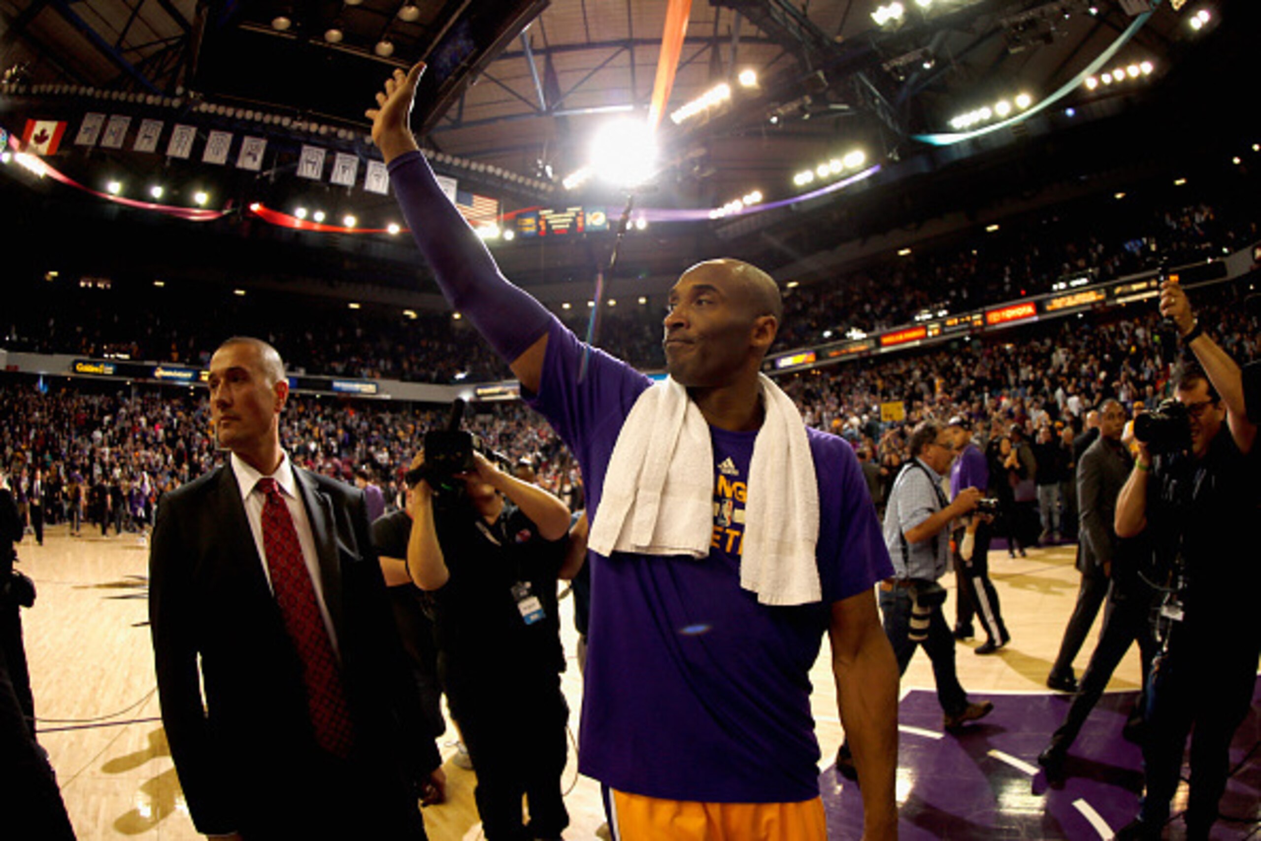 SACRAMENTO, CA - JANUARY 07:  Kobe Bryant #24 of the Los Angeles Lakers waves to the crowd after their game against the Sacramento Kings at Sleep Train Arena on January 7, 2016 in Sacramento, California.  NOTE TO USER: User expressly acknowledges and agre