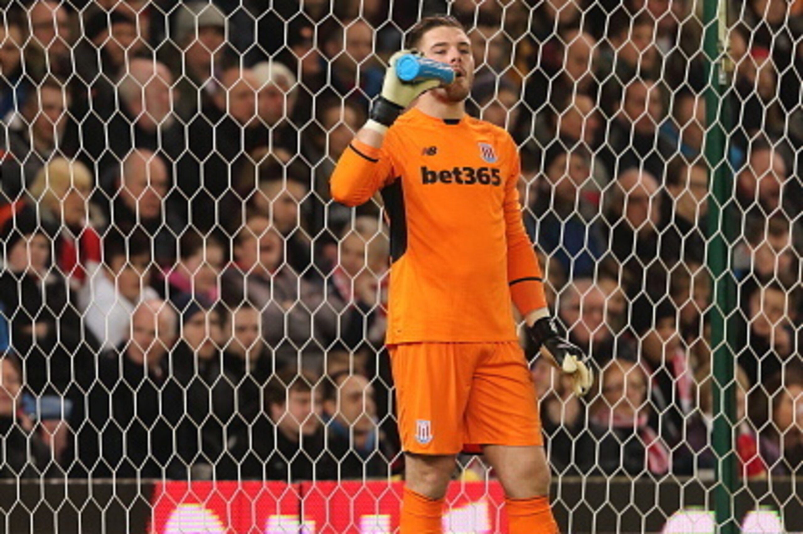 STOKE ON TRENT, ENGLAND - JANUARY 05: Jack Butland of Stoke City takes a drink during the Capital One Cup Semi Final, First Leg, between Stoke City and Liverpool at Britannia Stadium on January 5, 2016 in Stoke on Trent, England.  (Photo by Matthew Ashton
