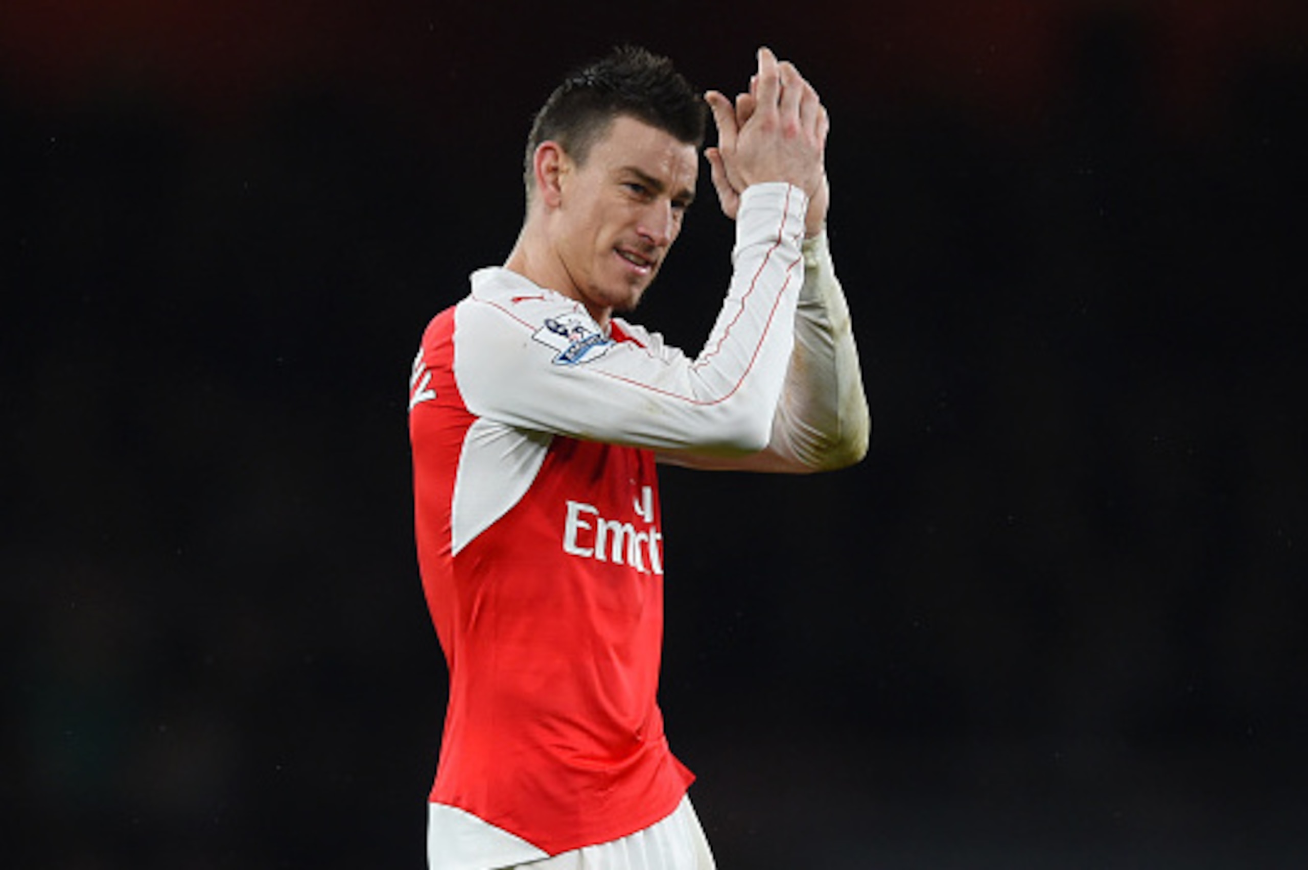 LONDON, ENGLAND - JANUARY 02:  Laurent Koscielny of Arsenal applauds the supporters after the Barclays Premier League match between Arsenal and Newcastle United at Emirates Stadium on January 2, 2016 in London, England.  (Photo by Shaun Botterill/Getty Im