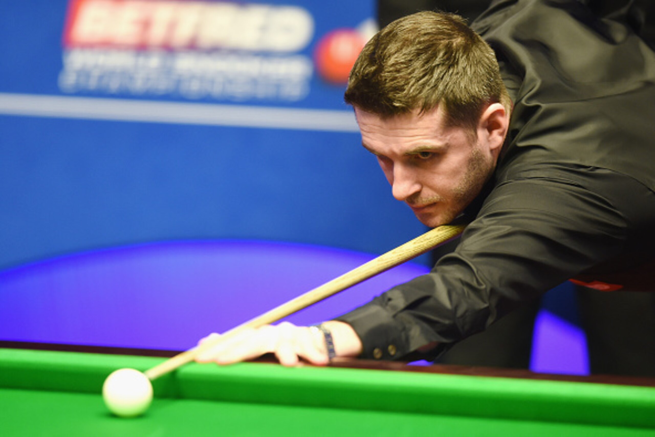 SHEFFIELD, ENGLAND - APRIL 23:  Mark Selby of England plays a shot against Anthony McGill of Scotland during day six of the 2015 Betfred World Snooker Championship at Crucible Theatre on April 23, 2015 in Sheffield, England.  (Photo by Michael Regan/Getty