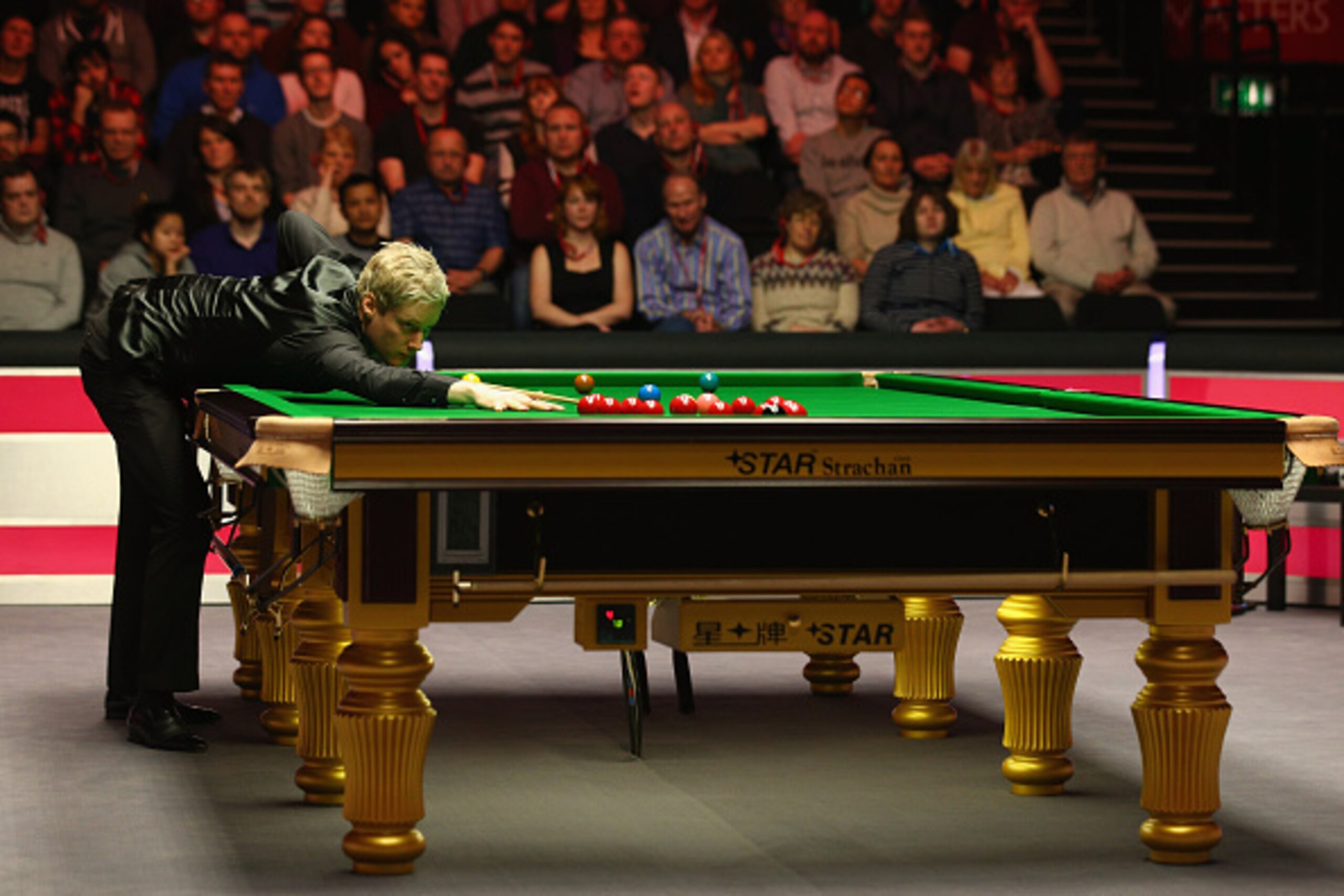 LONDON, ENGLAND - JANUARY 12:  Neil Robertson of Australia plays a shot during his first round match against Robert Milkins  of England on day Two of the 2015 Dafabet Masters at Alexandra Palace on January 12, 2015 in London, England.  (Photo by Ian Walto