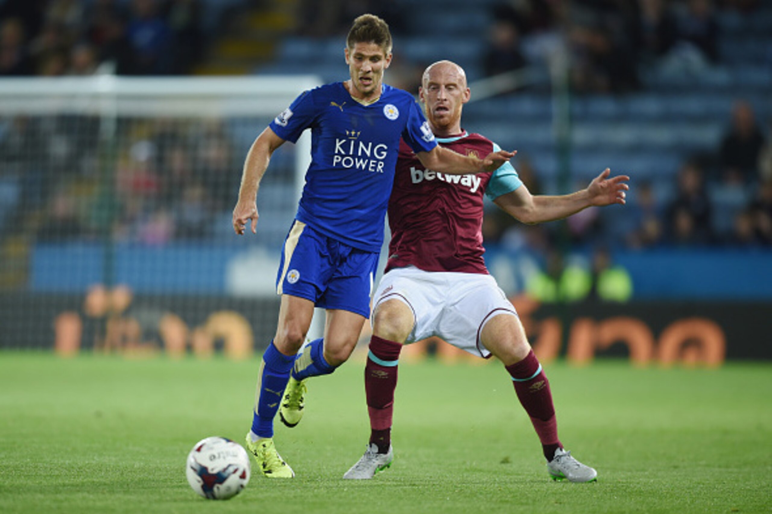 LEICESTER, ENGLAND - SEPTEMBER 22: Andrej Kramaric of Leicester in action with James Collins of West Ham during the Capital One Cup Third Round match between Leicester City and West Ham United at The King Power Stadium on September 22, 2015 in Leicester, 