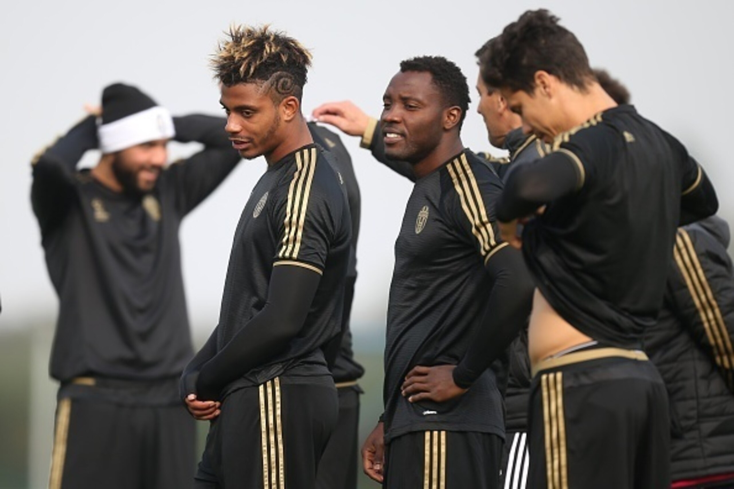 Juventus' defender Mario Lemina from France (2nd L) and Juventus' midfielder Kwadwo Asamoah from Ghana (C) take part in a training session on the eve of the UEFA Champions League football match Juventus Vs Borussia Moenchengladbach on October 20, 2015 at Juventus' defender Mario Lemina from France (2nd L) and Juventus' midfielder Kwadwo Asamoah from Ghana (C) take part in a training session on the eve of the UEFA Champions League football match Juventus Vs Borussia Moenchengladbach on October 20, 2015 at