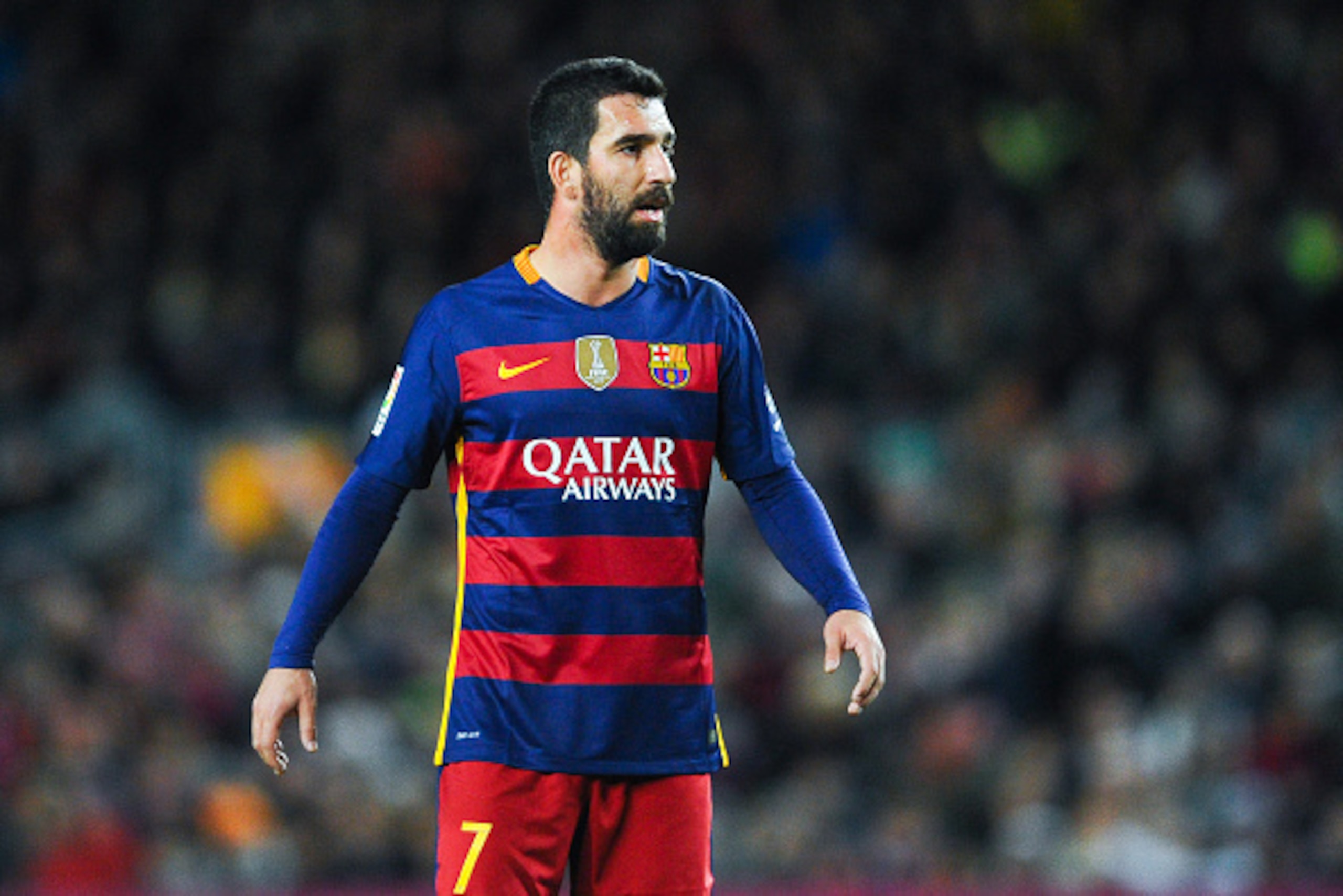 BARCELONA, SPAIN - JANUARY 06:  Arda Turan of FC Barcelona looks on during the Copa del Rey Round of 16 first leg match between FC Barcelona and RCD Espanyol at Camp Nou on January 6, 2016 in Barcelona, Spain.  (Photo by David Ramos/Getty Images)