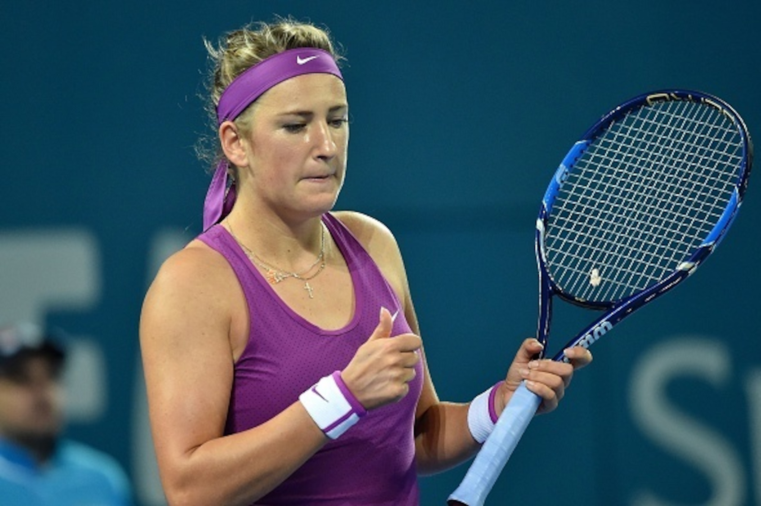 Victoria Azarenka of Belarus gets ready to serve against Samantha Crawford of the US during their women's singles semi-final on the sixth day of the Brisbane International tennis tournament on January 8, 2016. AFP PHOTO / Saeed KHAN
-- IMAGE RESTRICTED TO