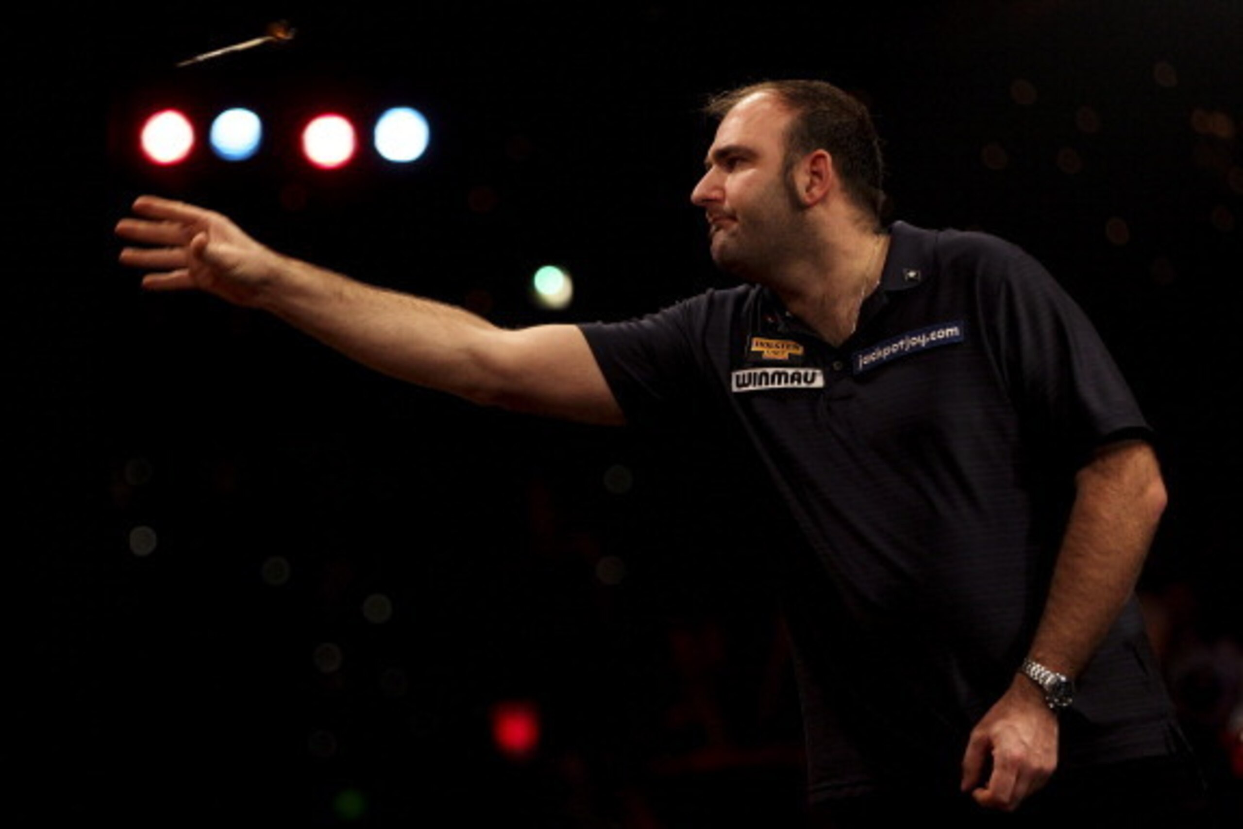 FRIMLEY, ENGLAND - JANUARY 13: Scott Waites of England in action during the final of the BDO Lakeside World Professional Darts Championships at the Lakeside Country Club on January 13, 2013 in Frimley, England. (Photo by Ben Hoskins/Getty Images)
