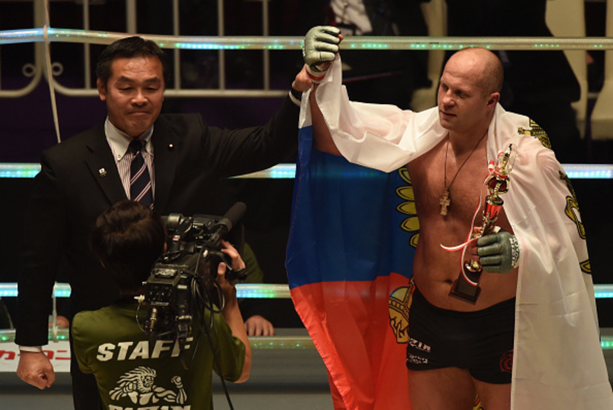 SAITAMA, JAPAN - DECEMBER 31:  Fedor Emelianenko of Russia celebrates his victory  with Hiroshi Hase the Minister of Education,Culture,Sports,Science and Technology Japan in the bout Rizin Fighting World Grand Prix against Singh Jaideep of India during th