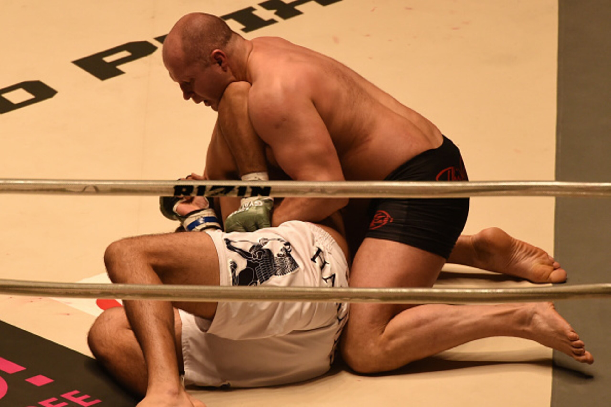 SAITAMA, JAPAN - DECEMBER 31:  Fedor Emelianenko of Russia attempts a submission on Singh Jaideep of india in the bout Rizin Fighting World Grand Prix during the Rizin Iza Saltation at Saitama Super Arena on December 31, 2015 in Saitama, Japan.  (Photo by