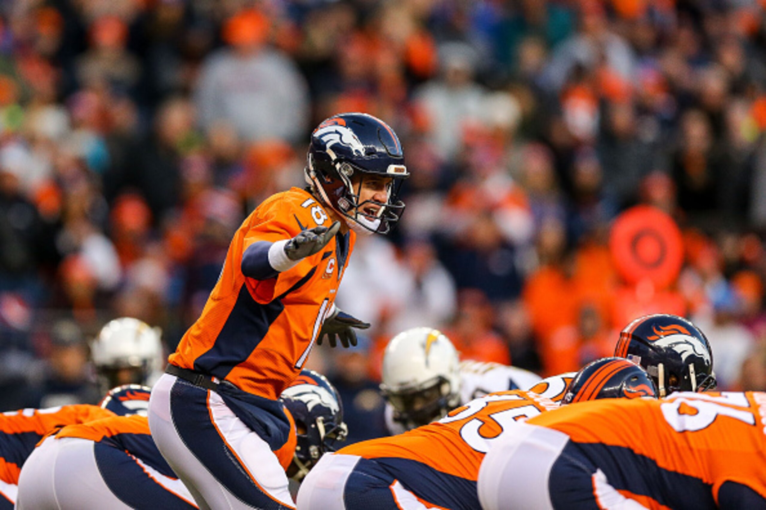 DENVER, CO - JANUARY 3:  Quarterback Peyton Manning #18 of the Denver Broncos runs the offense against the San Diego Chargers during a game at Sports Authority Field at Mile High on January 3, 2016 in Denver, Colorado. (Photo by Justin Edmonds/Getty Image