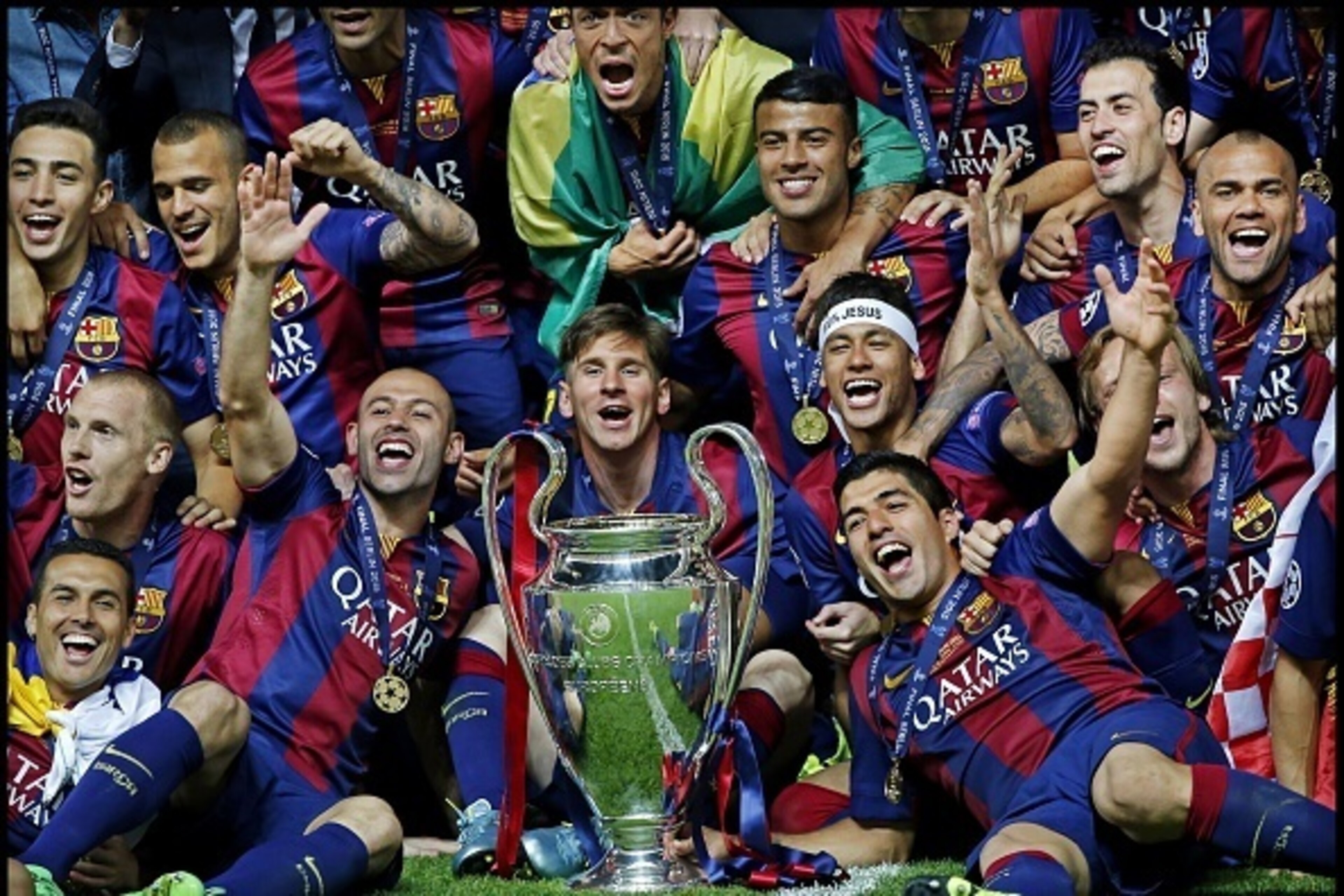 (L-R) Javier Mascherano, Lionel Messi, Neymar, Luis Suarez, Sergio Busquets, Daniel Alves of FC Barcelona posing with the Cup during the UEFA Champions League  final match between Barcelona and Juventus on June 6, 2015 at the Olympic stadium in Berlin, Ge