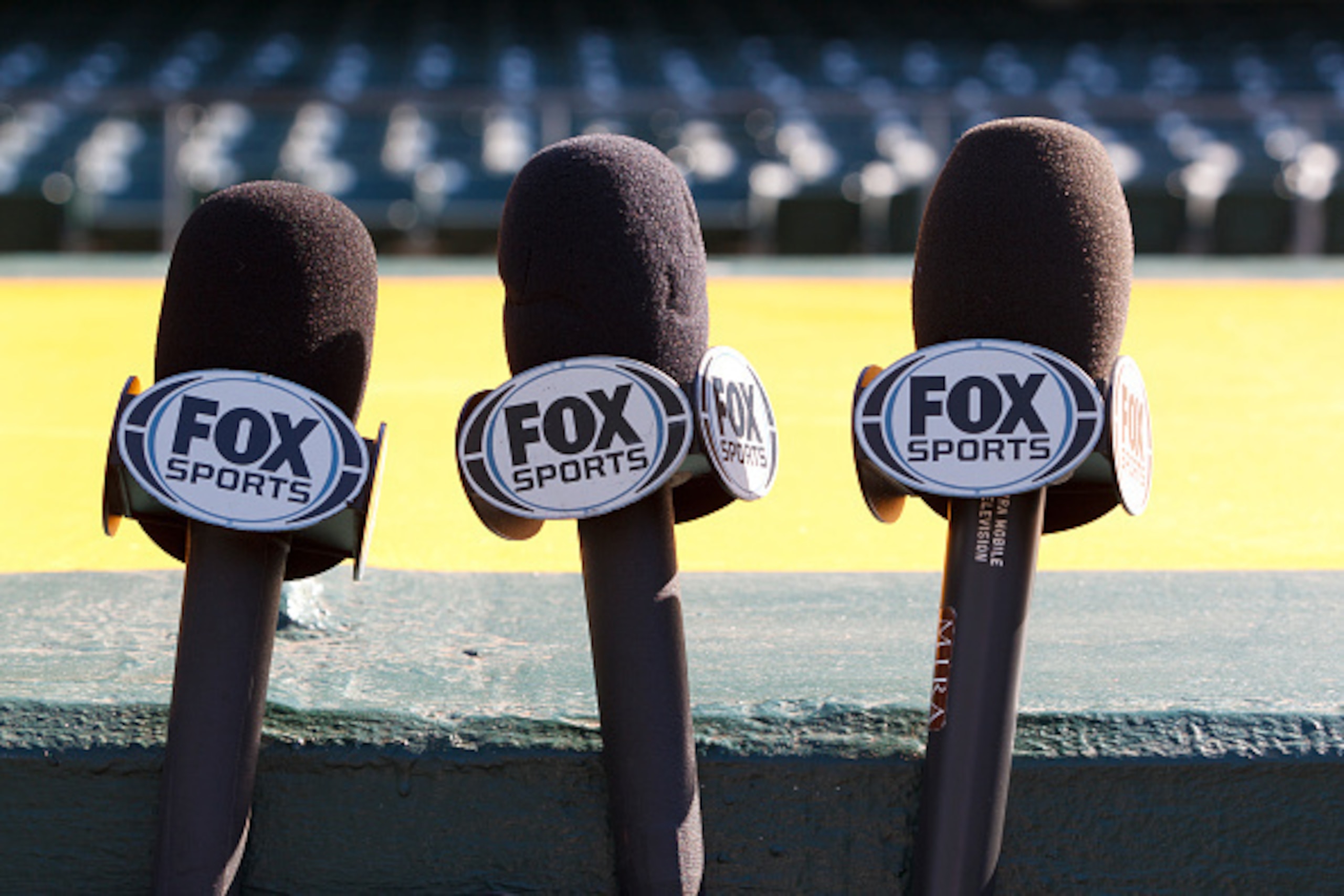 OAKLAND, CA - APRIL 29: Detailed view of Fox Sports microphones outside the dugout before the game between the Oakland Athletics and the Los Angeles Angels of Anaheim at O.co Coliseum on April 29, 2015 in Oakland, California. The Los Angeles Angels of An OAKLAND, CA - APRIL 29: Detailed view of Fox Sports microphones outside the dugout before the game between the Oakland Athletics and the Los Angeles Angels of Anaheim at O.co Coliseum on April 29, 2015 in Oakland, California. The Los Angeles Angels of An