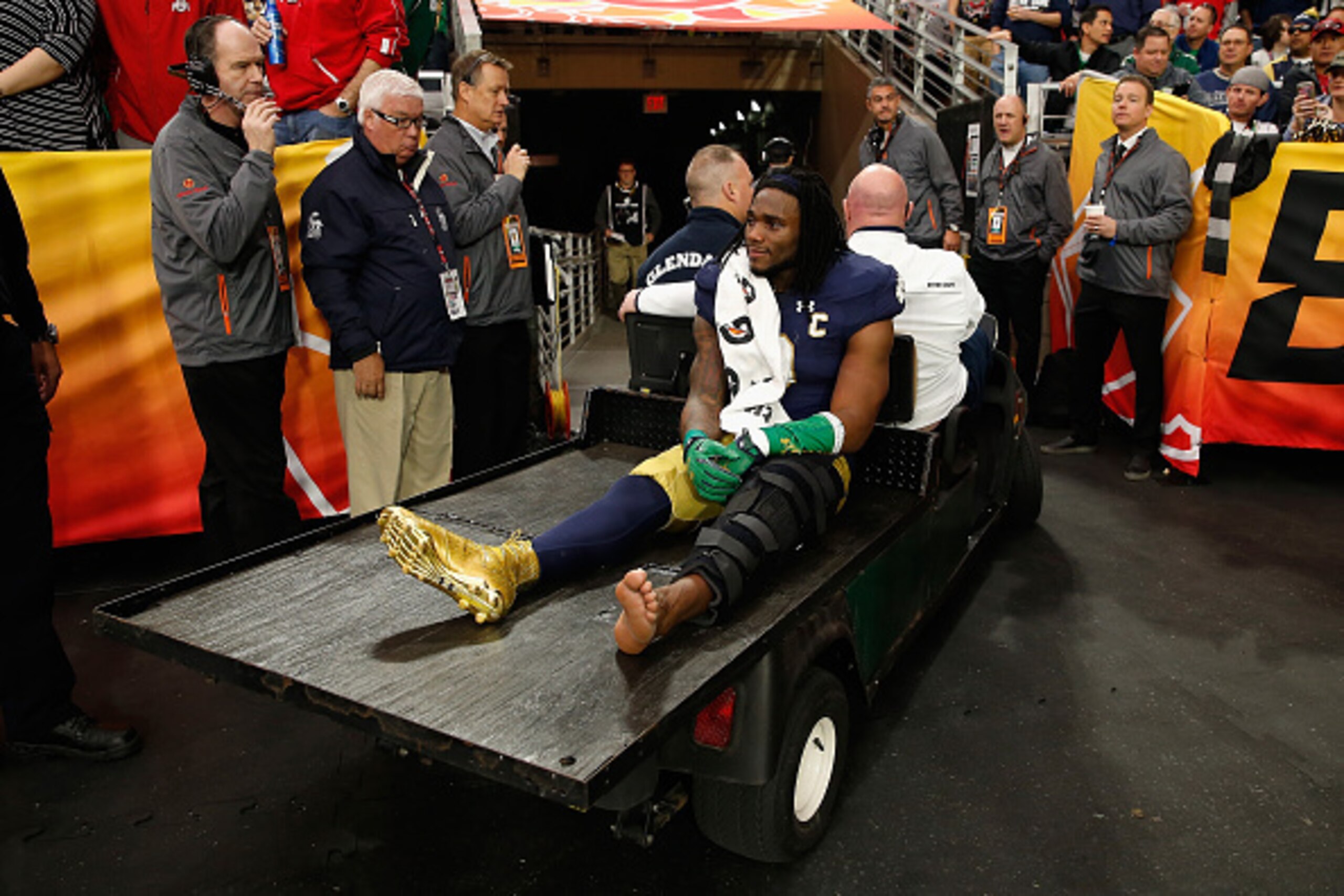 GLENDALE, AZ - JANUARY 01:  Linebacker Jaylon Smith #9 of the Notre Dame Fighting Irish is carted off the field after an injury during the first quarter of the BattleFrog Fiesta Bowl against the Ohio State Buckeyes at University of Phoenix Stadium on Janu