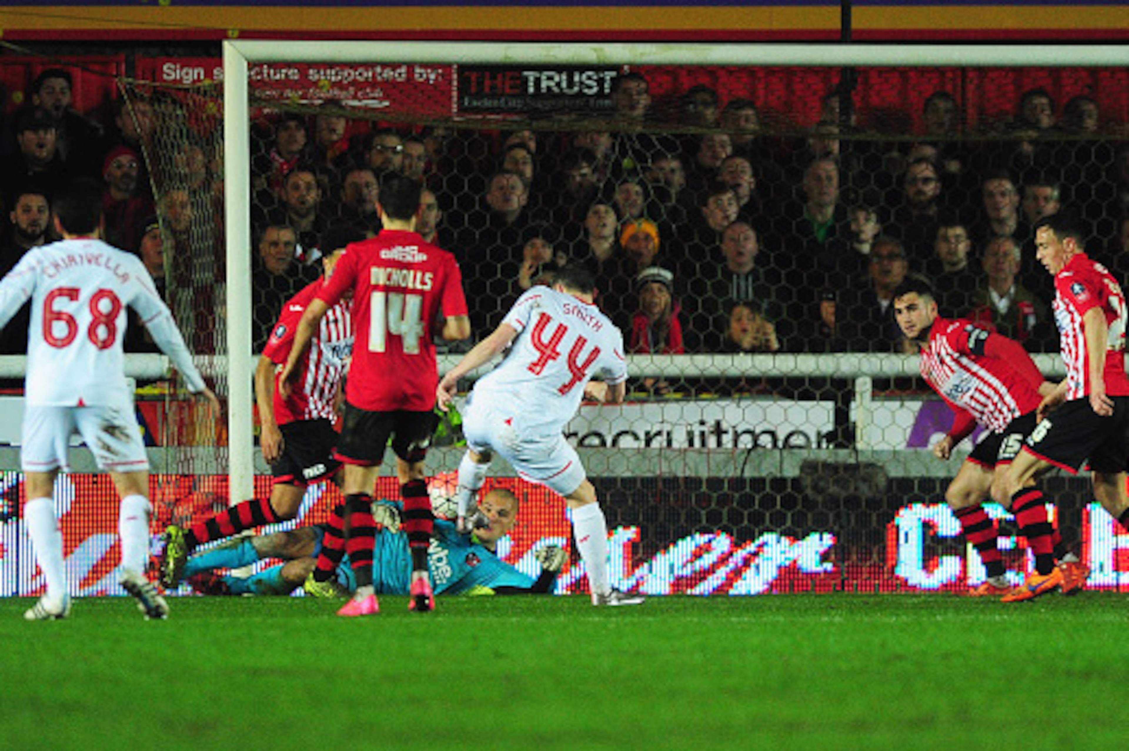 EXETER, ENGLAND - JANUARY 08:  Brad Smith of Liverpool (44) scores their second goal during the Emirates FA Cup third round match between Exeter City and Liverpool at St James Park on January 8, 2016 in Exeter, England.  (Photo by Dan Mullan/Getty Images)