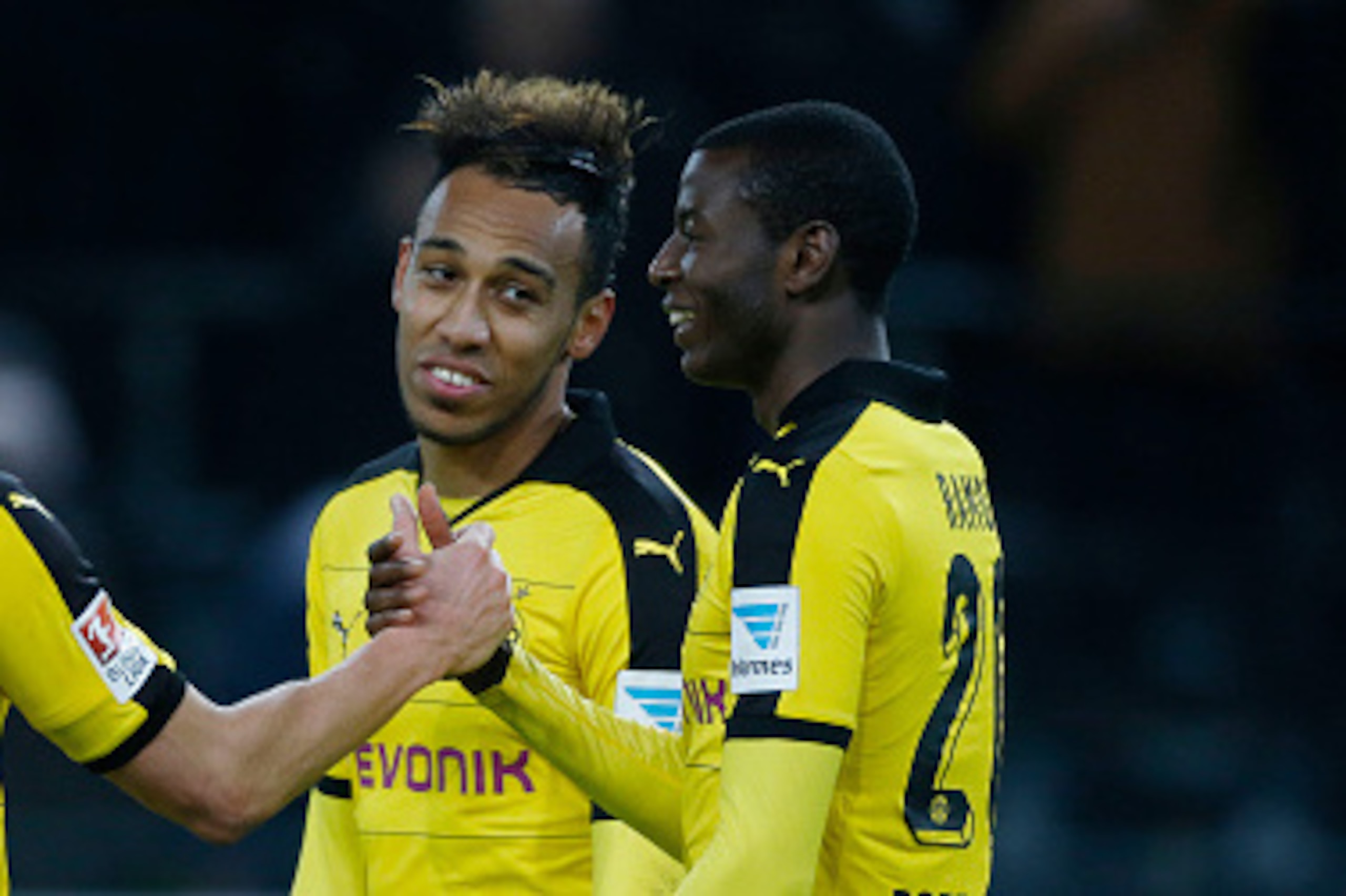Dortmund's Gabonese striker Pierre-Emerick Aubameyang (C) celebrates scoring with his teammate Polish defender Lukasz Piszczek (L) and Columbian striker Adrian Ramos during the German first division Bundesliga football match Borussia Dortmund vs VfB Stutt
