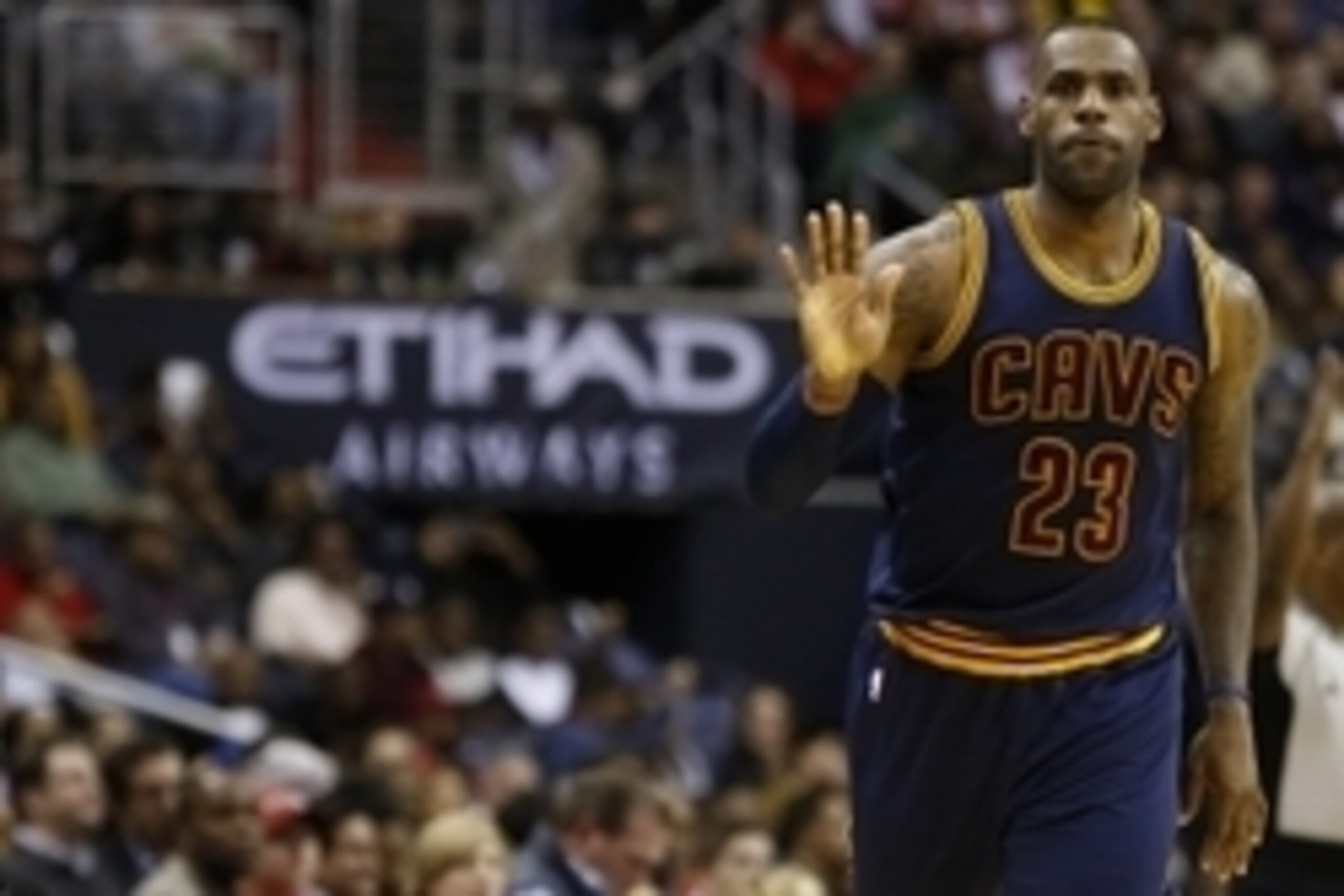 Jan 6, 2016; Washington, DC, USA; Cleveland Cavaliers forward LeBron James (23) reacts after making a three point basket against the Washington Wizards in the third quarter at Verizon Center. The Cavaliers won 121-115. Mandatory Credit: Geoff Burke-USA TO