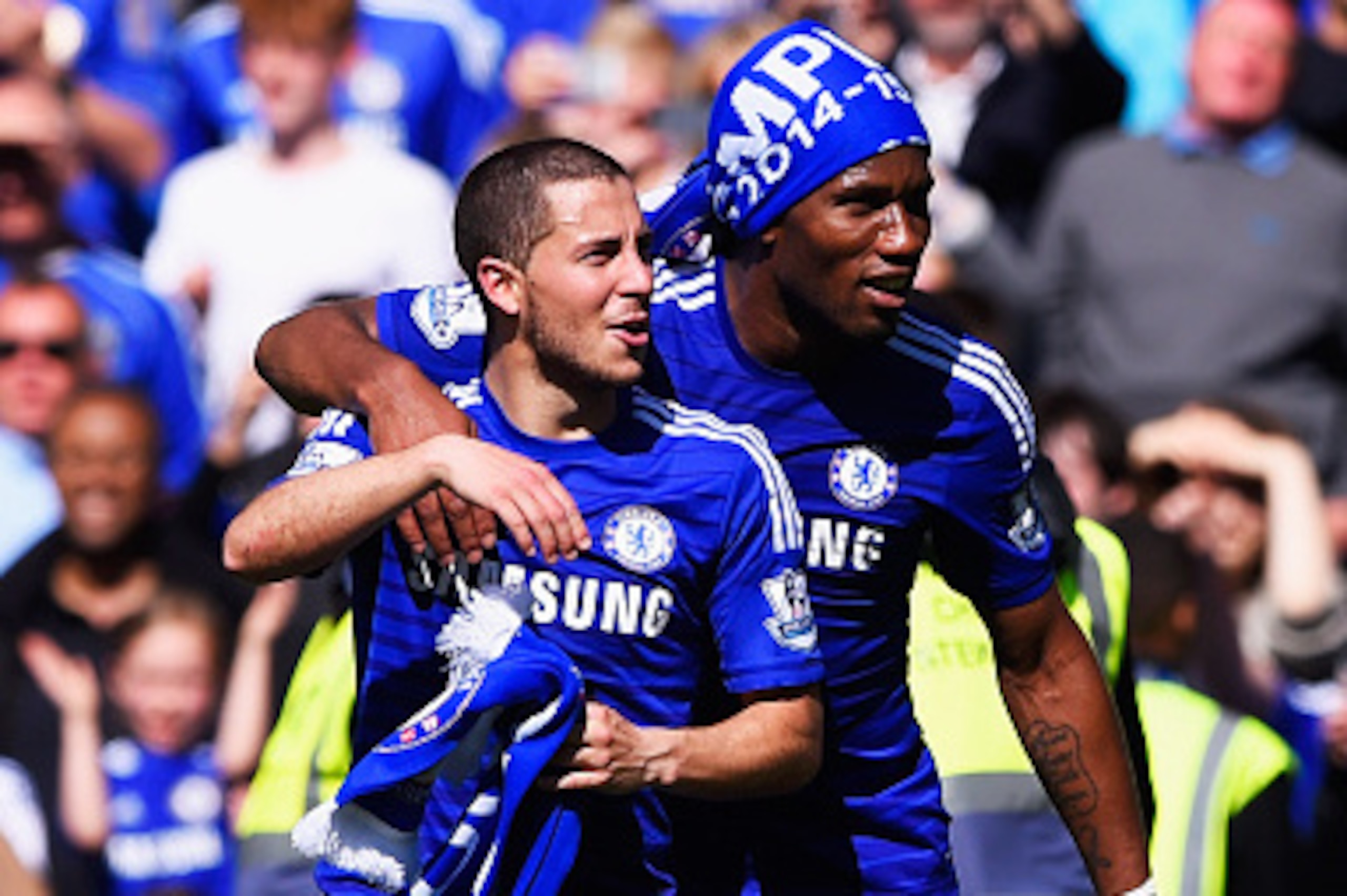 LONDON, ENGLAND - MAY 03: Eden Hazard (L) and Didier Drogba of Chelsea celebrate winning the Premier League title after the Barclays Premier League match between Chelsea and Crystal Palace at Stamford Bridge on May 3, 2015 in London, England. Chelsea bec LONDON, ENGLAND - MAY 03: Eden Hazard (L) and Didier Drogba of Chelsea celebrate winning the Premier League title after the Barclays Premier League match between Chelsea and Crystal Palace at Stamford Bridge on May 3, 2015 in London, England. Chelsea bec
