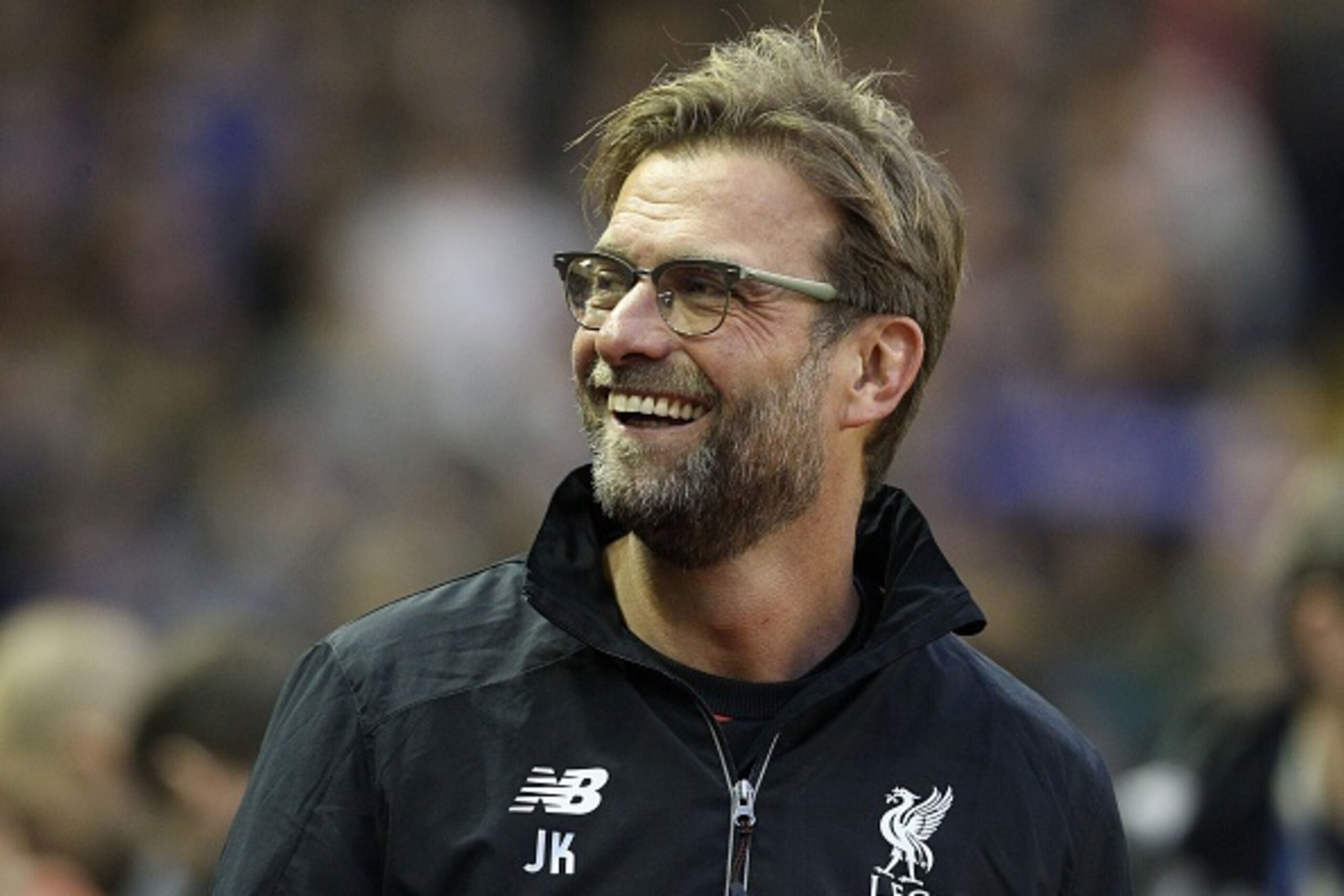 Liverpool's German manager Jurgen Klopp smiles during the English Premier League football match between Liverpool and Leicester City at the Anfield stadium in Liverpool, north-west England on December 26, 2015. Liverpool won 1-0.  / AFP / LINDSEY PARNABY 