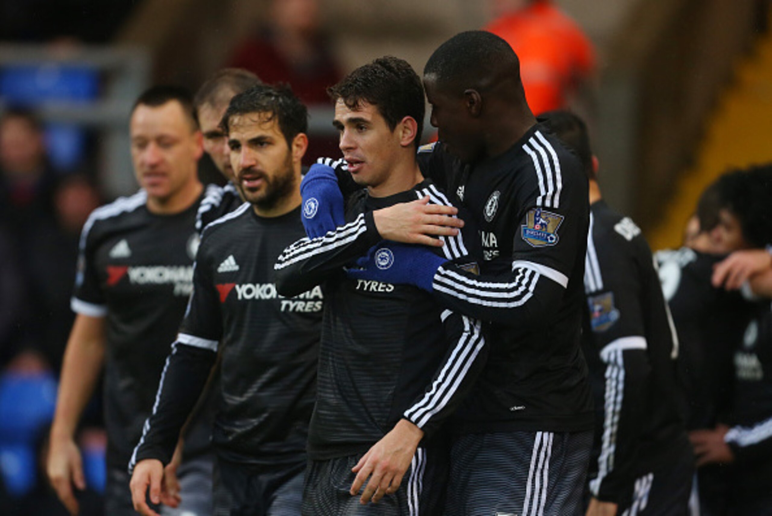 LONDON, ENGLAND - JANUARY 03:  Kurt Zouma of Chelsea hugs Oscar of Chelsea during the Barclays Premier League match between Crystal Palace and Chelsea at Selhurst Park on January 3, 2016 in London, England.  (Photo by Catherine Ivill - AMA/Getty Images)
