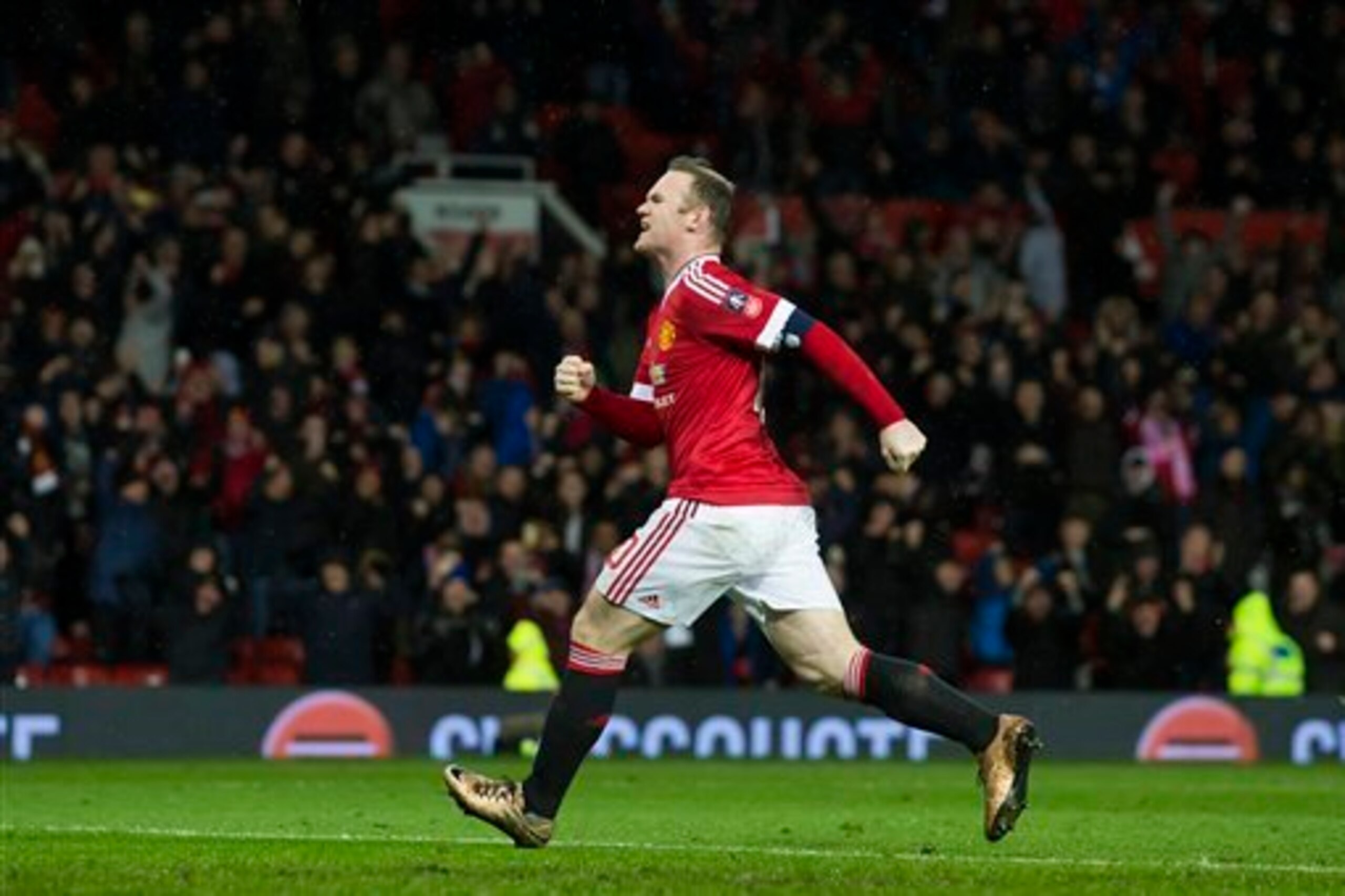 Rooney celebrates his successful penalty