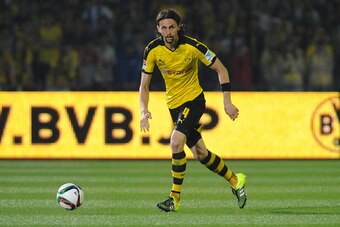 KAWASAKI, JAPAN - JULY 07:  Neven Subotic #4 of Borussia Dortmund in action during the preseason friendly match between Kawasaki Frontale and Borussia Dortmund at Todoroki Stadium on July 7, 2015 in Kawasaki, Kanagawa, Japan.  (Photo by Masashi Hara/Getty