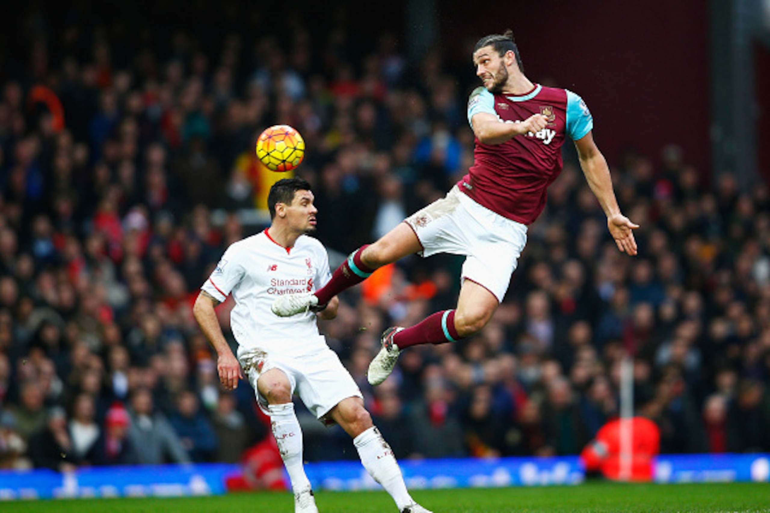 LONDON, ENGLAND - JANUARY 02: Andy Carroll of West Ham United and Dejan Lovren of Liverpool compete for the ball during the Barclays Premier League match between West Ham United and Liverpool at Boleyn Ground on January 2, 2016 in London, England. (Photo LONDON, ENGLAND - JANUARY 02: Andy Carroll of West Ham United and Dejan Lovren of Liverpool compete for the ball during the Barclays Premier League match between West Ham United and Liverpool at Boleyn Ground on January 2, 2016 in London, England. (Photo