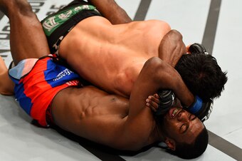 NEWARK, NJ - APRIL 18:  Aljamain Sterling puts Takeya Mizugaki of Japan in a triangle hold to win by tap out in their bantamweight bout during the UFC Fight Night event at Prudential Center on April 18, 2015 in Newark, New Jersey.  (Photo by Josh Hedges/Z