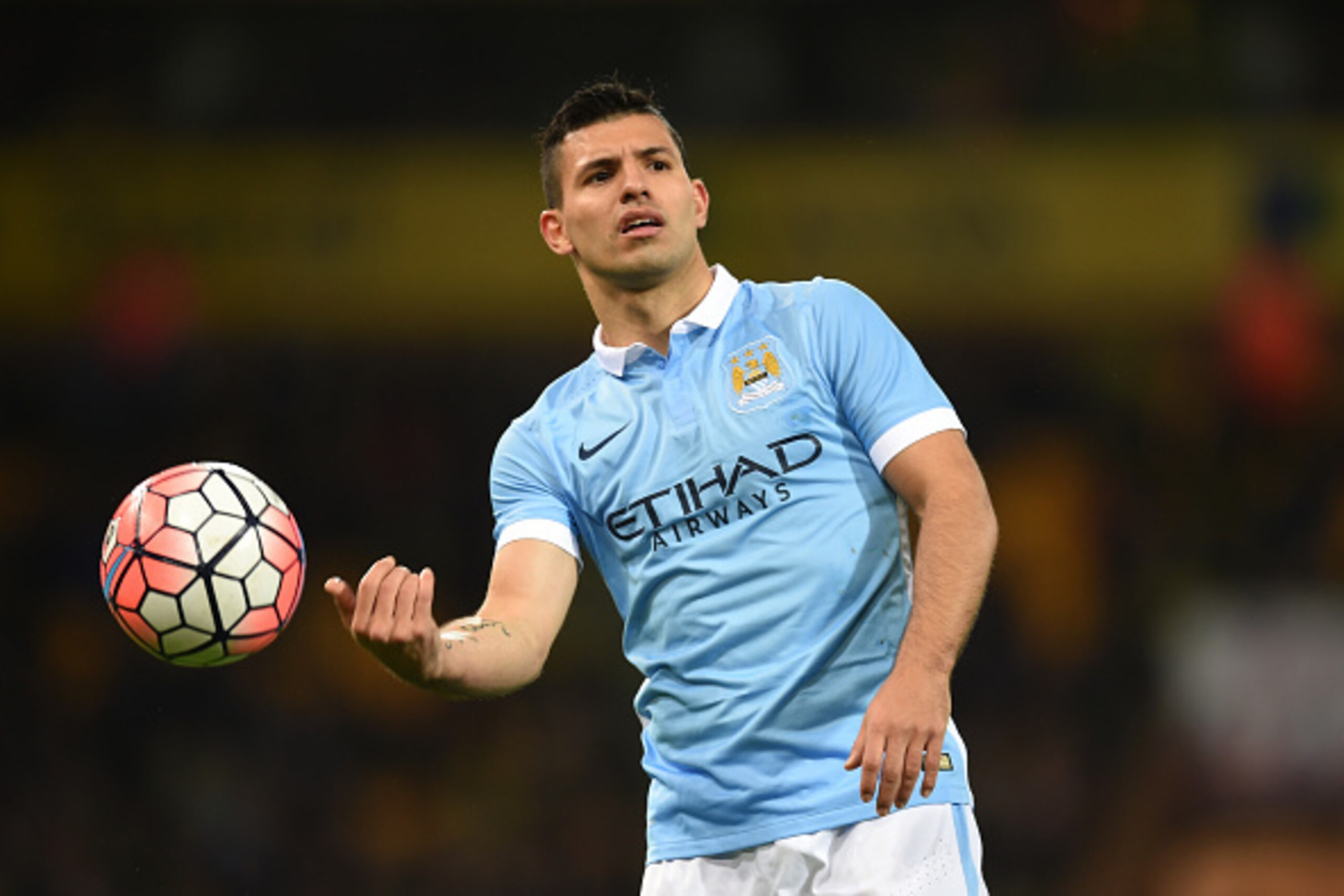 NORWICH, ENGLAND - JANUARY 09:  Sergio Aguero of Manchester City throws the ball during the Emirates FA Cup third round match between Norwich City and Manchester City at Carrow Road on January 9, 2016 in Norwich, England.  (Photo by Michael Regan/Getty Im