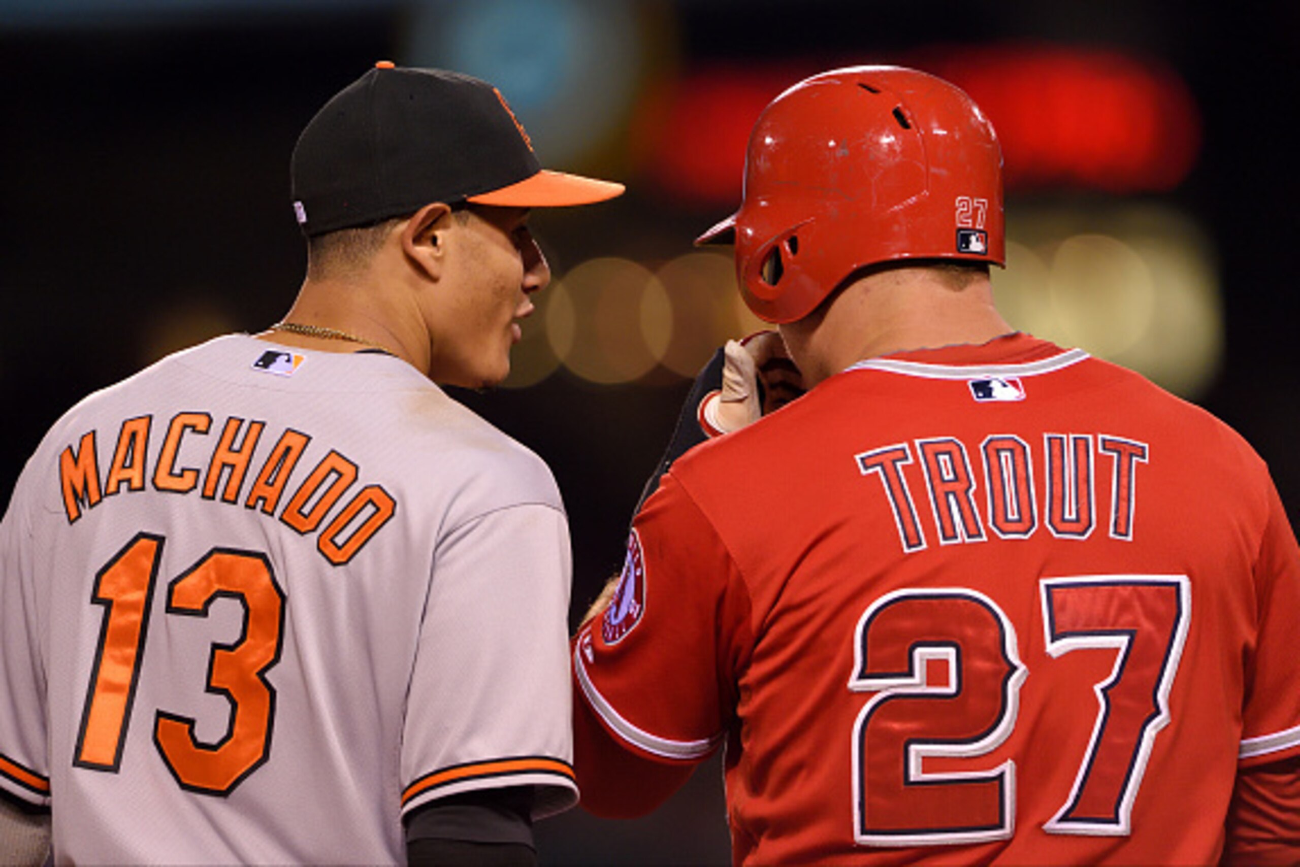ANAHEIM, CA - AUGUST 8: Manny Machado #13 of the Baltimore Orioles and Mike Trout #27 of the Los Angeles Angels of Anaheim talk during the game at Angel Stadium of Anaheim on August 8, 2015 in Anaheim, California. (Photo by Matt Brown/Angels Baseball LP/G