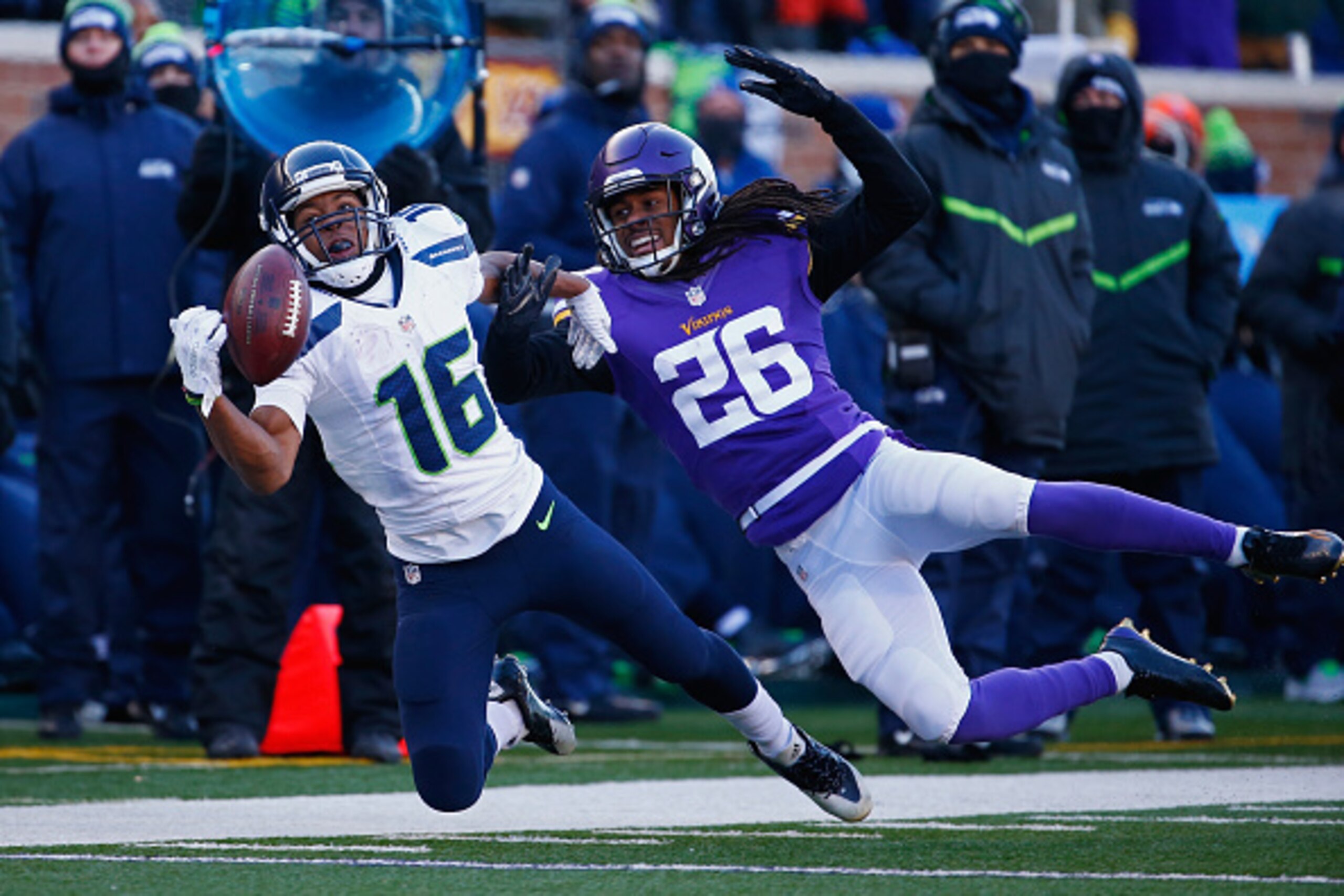 MINNEAPOLIS, MN - JANUARY 10:  Tyler Lockett #16 of the Seattle Seahawks is unable to catch a pass as he is defended by Trae Waynes #26 of the Minnesota Vikings in the second half during the NFC Wild Card Playoff game at TCFBank Stadium on January 10, 201