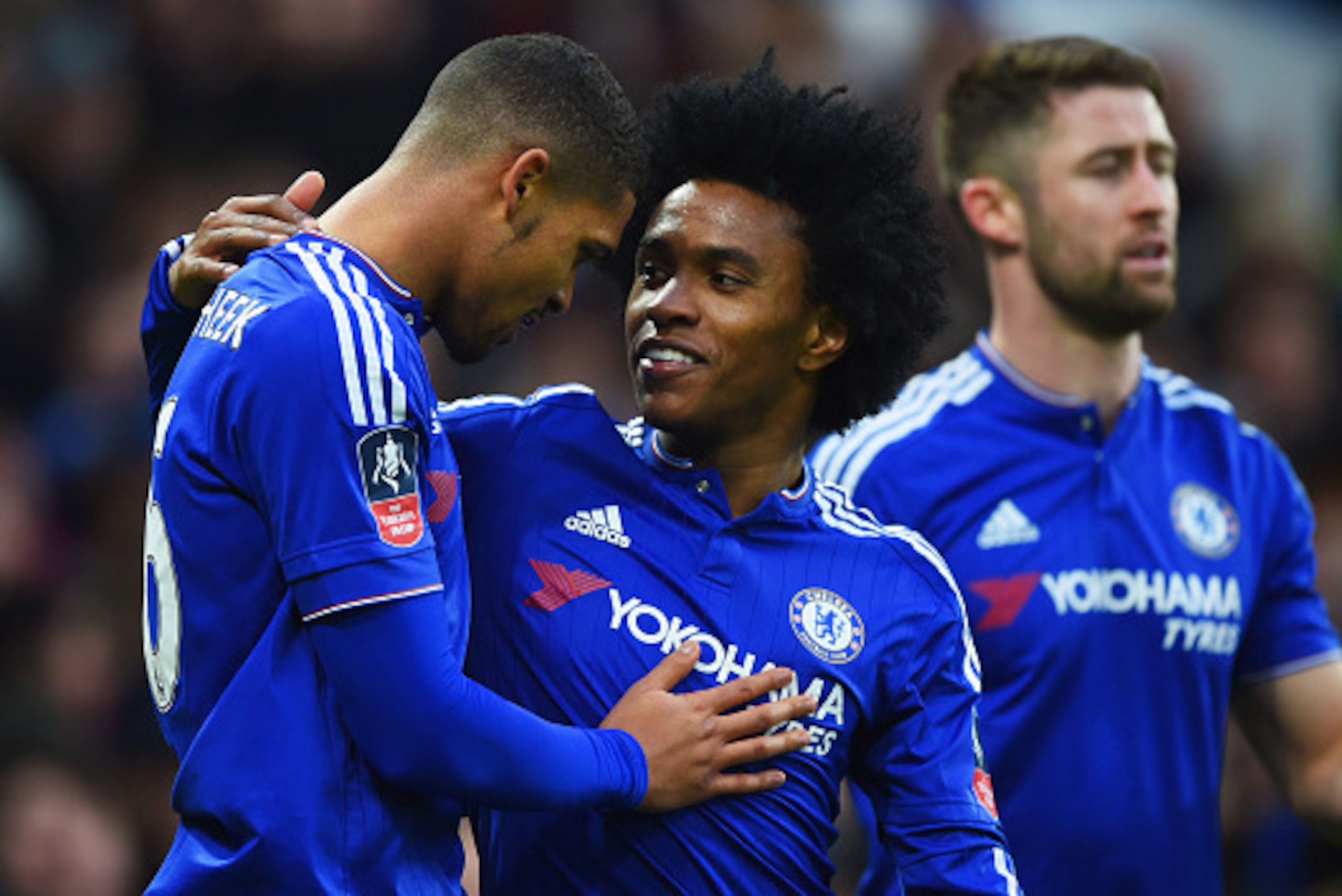 LONDON, ENGLAND - JANUARY 10:  Ruben Loftus-Cheek of Chelsea (L) celebrates with Willian as he scores their second goal during the Emirates FA Cup third round match between Chelsea and Scunthorpe United at Stamford Bridge on January 10, 2016 in London, En