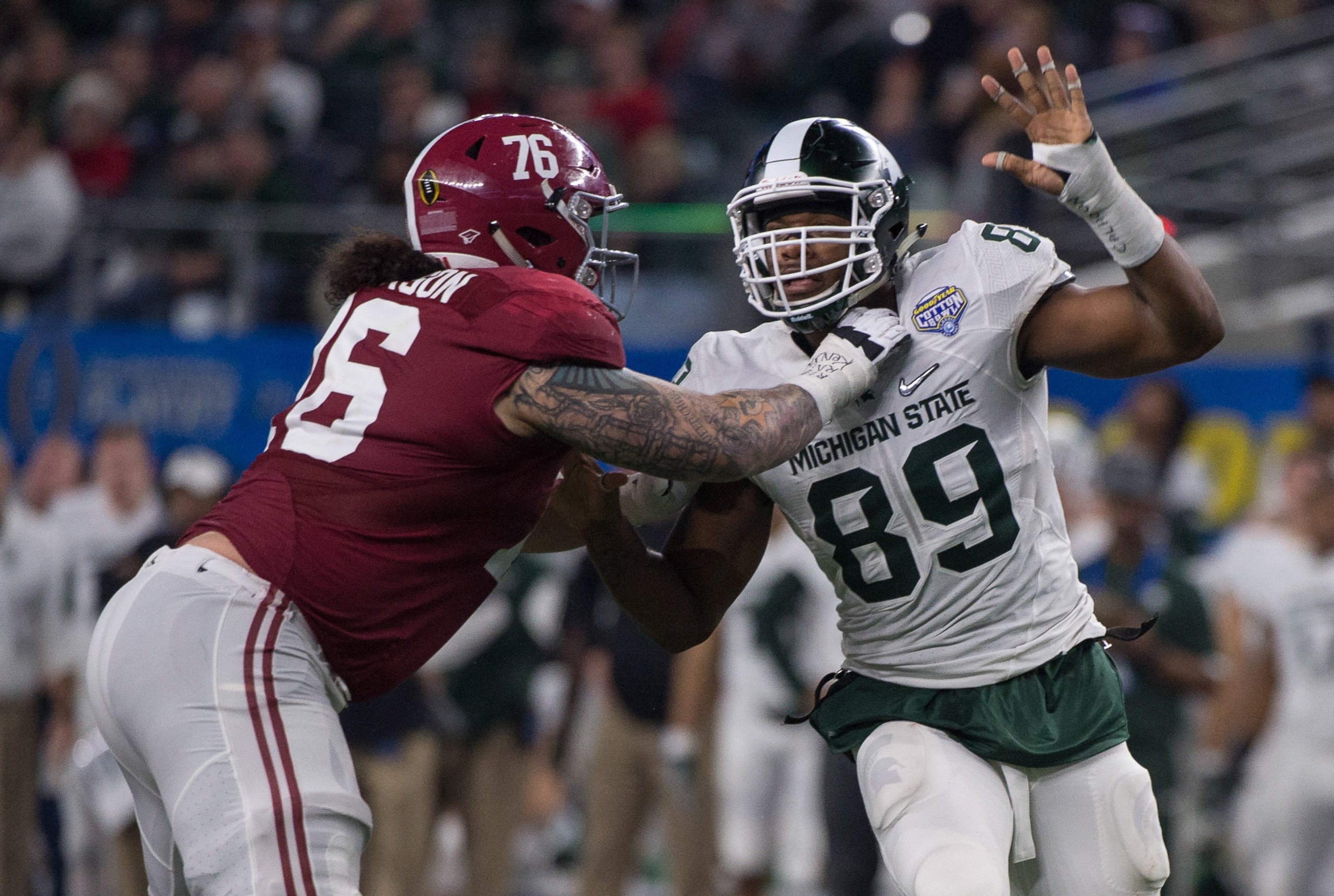 Dec 31, 2015; Arlington, TX, USA; Alabama Crimson Tide offensive lineman Dominick Jackson (76) and Michigan State Spartans defensive end Shilique Calhoun (89) during the game in the 2015  Cotton Bowl at AT&T Stadium. Mandatory Credit: Jerome Miron-USA TOD
