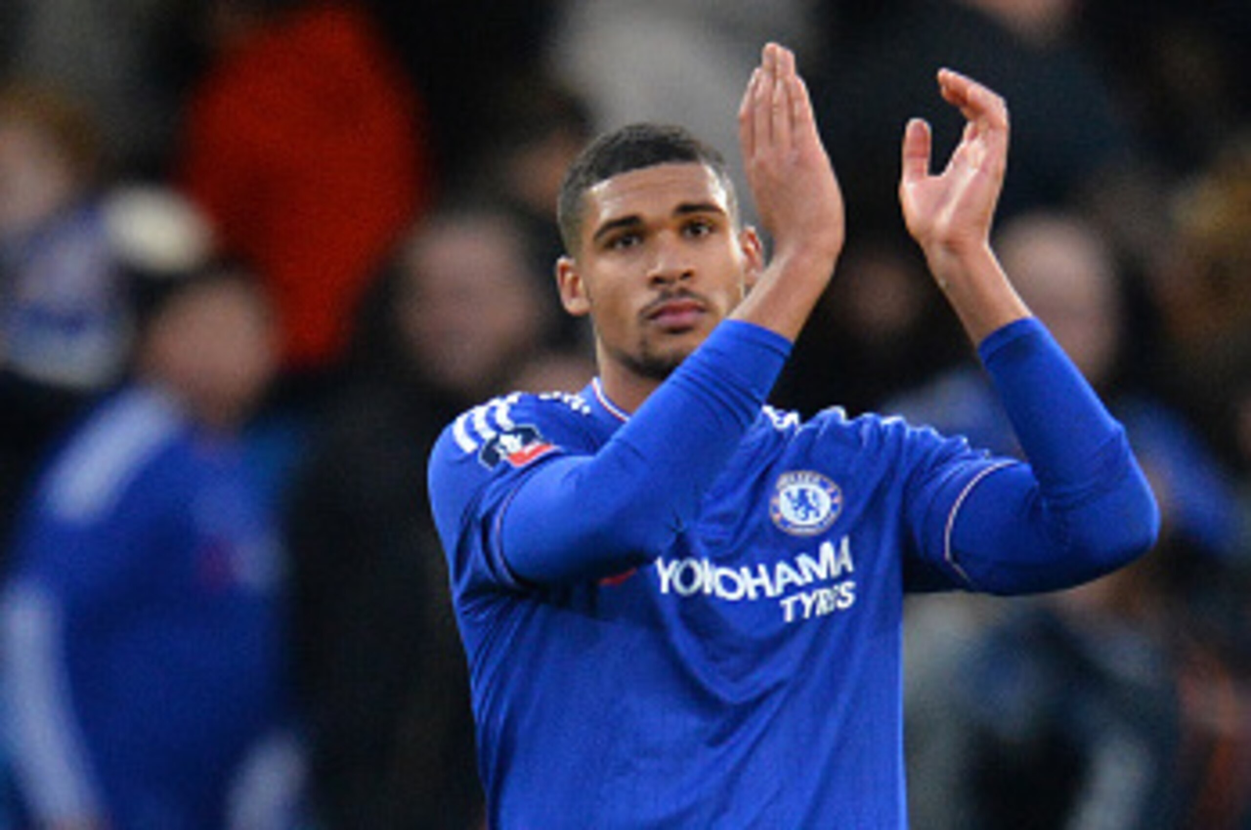 Chelsea's English midfielder Ruben Loftus-Cheek applauds the fans following the FA Cup third-round football match between Chelsea and Scunthorpe United at Stamford Bridge in London on January 10, 2016. Chelsea won the match 2-0.   AFP PHOTO / GLYN KIRK

R