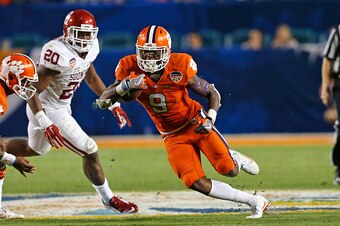MIAMI GARDENS, FL - DECEMBER 31: Wayne Gallman #9 of the Clemson Tigers runs with the ball against the Oklahoma Sooners during the 2015 Capital One Orange Bowl at Sun Life Stadium on December 29, 2015 in Miami Gardens, Florida. Clemson defeated Oklahoma 3