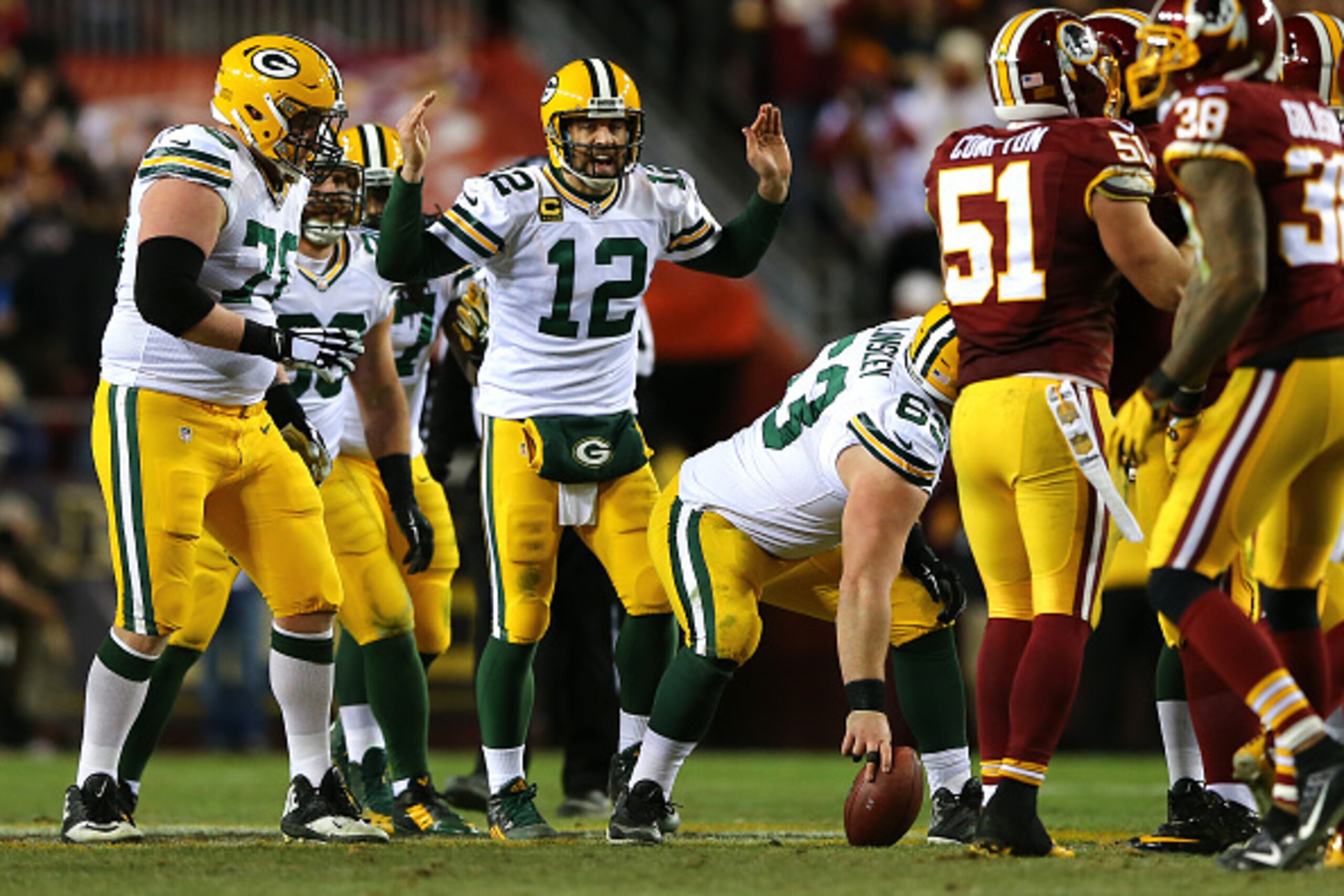 LANDOVER, MD - JANUARY 10: Quarterback Aaron Rodgers #12 of the Green Bay Packers calls from the line of scrimmage against the Washington Redskins in the third quarter during the NFC Wild Card Playoff game at FedExField on January 10, 2016 in Landover, Ma