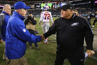 PHILADELPHIA, PA - OCTOBER 19: Head Coach Tom Coughlin of the New York Giants meets head coach Chip Kelly of the Philadelphia Eagles after the Eagles 27-7 win after the game at Lincoln Financial Field on October 19, 2015 in Philadelphia, Pennsylvania.  (P