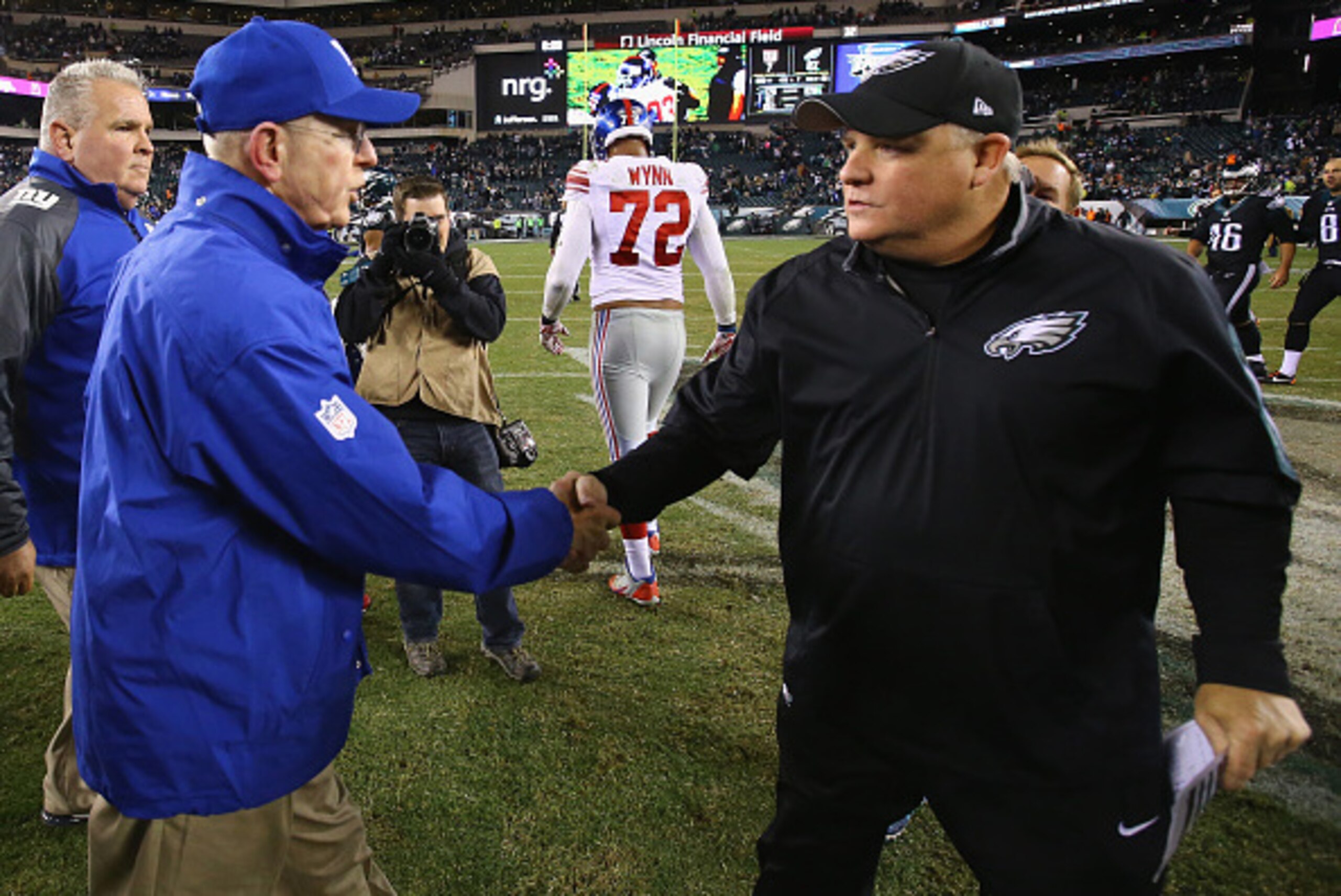 PHILADELPHIA, PA - OCTOBER 19: Head Coach Tom Coughlin of the New York Giants meets head coach Chip Kelly of the Philadelphia Eagles after the Eagles 27-7 win after the game at Lincoln Financial Field on October 19, 2015 in Philadelphia, Pennsylvania.  (P