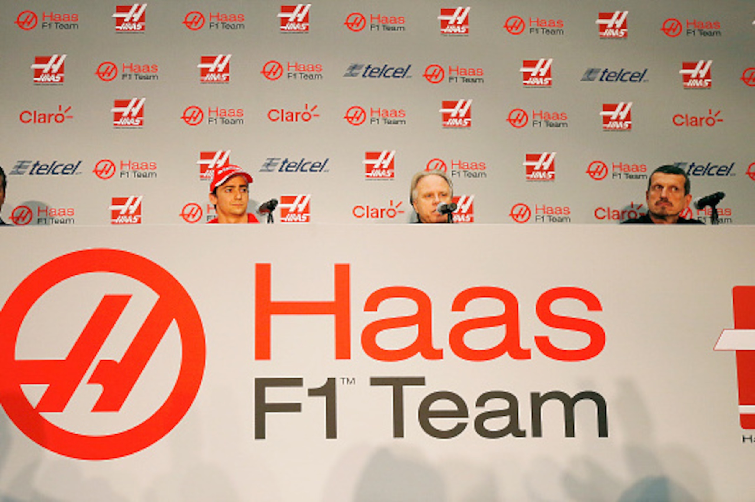 MEXICO CITY, MEXICO - OCTOBER 30:  (L-R) Carlos Slim Jr, Team sponsor, Esteban Gutierrez, Gene Haas, founder and chairman, and Guenther Steiner, team principal of Haas F1 Team, during their driver announcement  on October 30, 2015 in Mexico City, Mexico. 