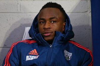 WEST BROMWICH, ENGLAND - JANUARY 02: Saido Berahino of West Bromwich Albion is seen on the bench prior to the Barclays Premier League match between West Bromwich Albion and Stoke City at The Hawthorns on January 2, 2016 in West Bromwich, England.  (Photo 