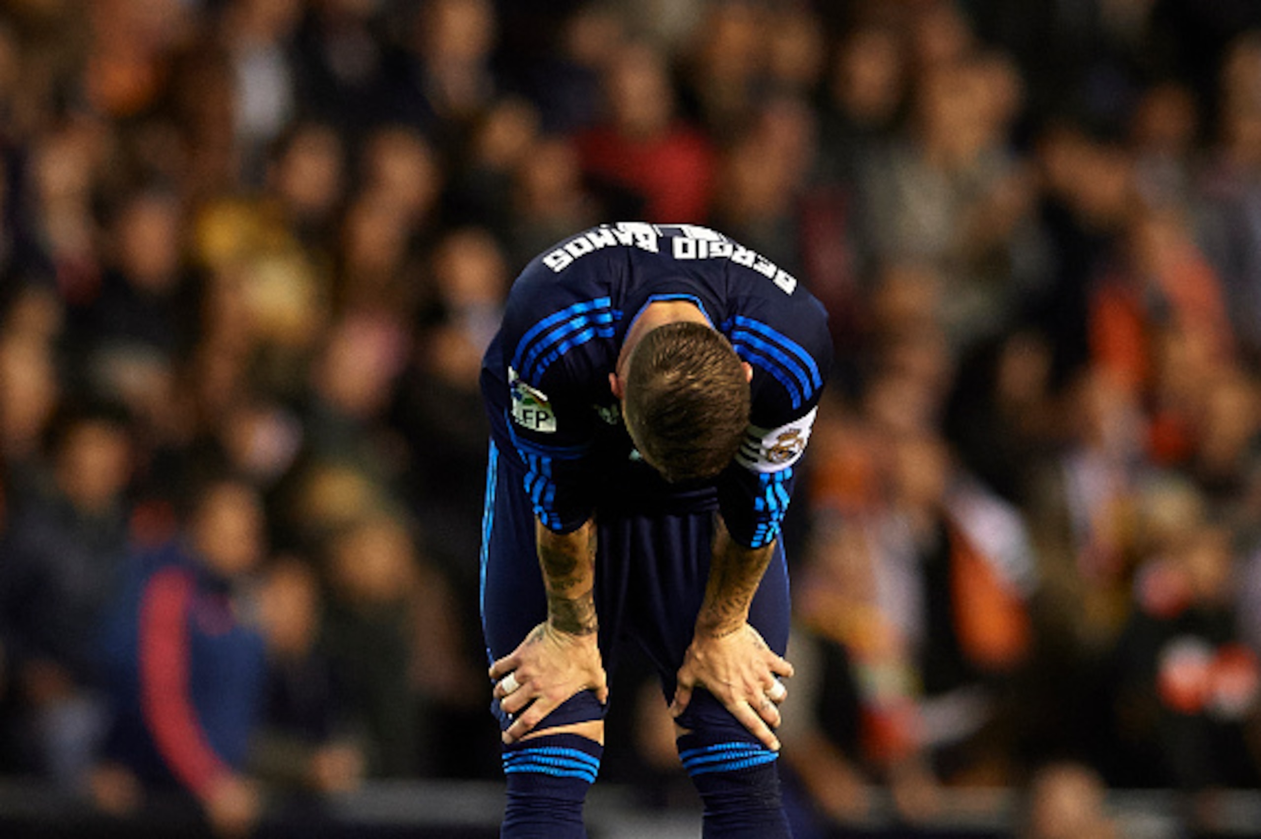 VALENCIA, SPAIN - JANUARY 03: Sergio Ramos of Real Madrid reacts at the end of the La Liga match between Valencia CF and Real Madrid CF at Estadi de Mestalla on January 03, 2016 in Valencia, Spain. (Photo by Manuel Queimadelos Alonso/Getty Images) VALENCIA, SPAIN - JANUARY 03: Sergio Ramos of Real Madrid reacts at the end of the La Liga match between Valencia CF and Real Madrid CF at Estadi de Mestalla on January 03, 2016 in Valencia, Spain. (Photo by Manuel Queimadelos Alonso/Getty Images)