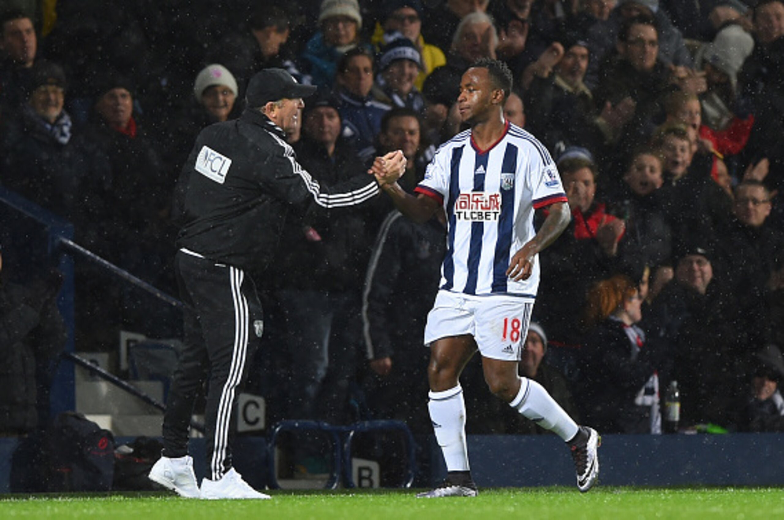 WEST BROMWICH, ENGLAND - JANUARY 09:  Saido Berahino of West Bromwich Albion shakes hands with manager Tony Pulis after scoring his team's first goal during the Emirates FA Cup Third Round match between West Bromwich Albion and Bristol City at The Hawthor